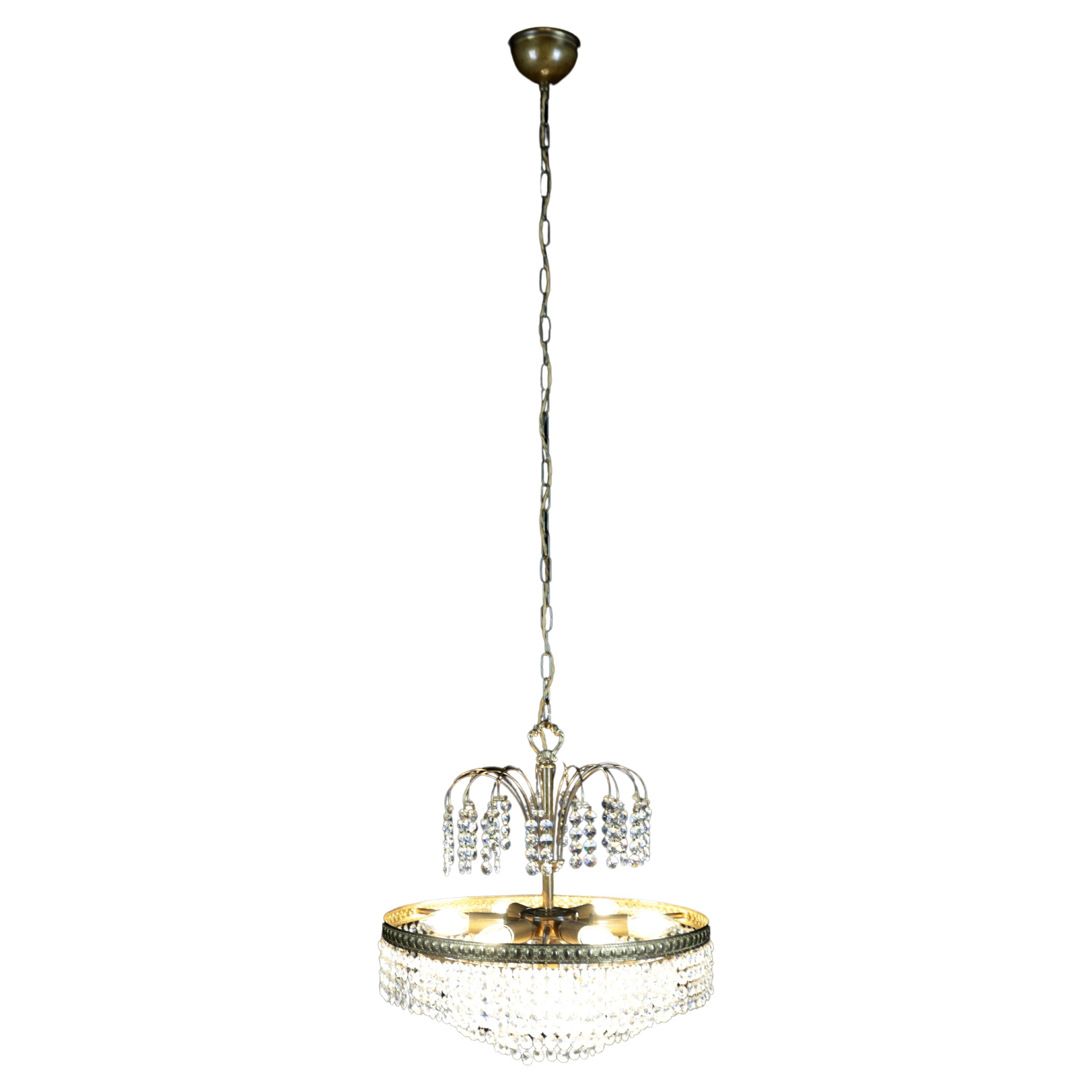 Designer crystal chandelier with cascading pendants For Sale