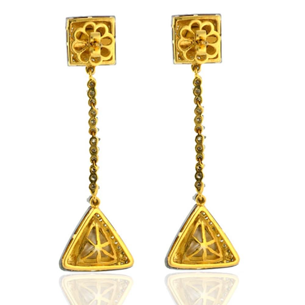 Designer dangle earring with rosecut diamond earring in 18K Gold and silver, is cool yet vintage looking. 

Closure: Push Post

18Kt Gold 5.485gms
Diamond 2.79cts