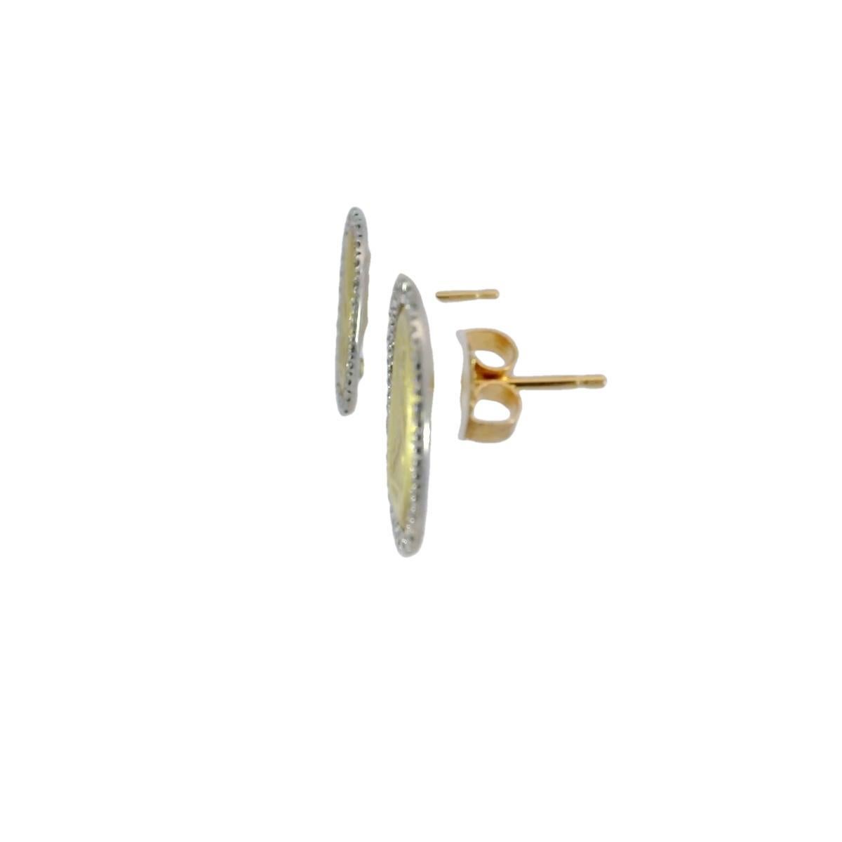 Clous d'oreilles pièce de créateur en or jaune 18 carats et diamants par MAZ 

Expression raffinée de l'élégance et de l'art, ces boucles d'oreilles sont conçues pour impressionner. Conçues en or jaune 18 carats, elles présentent un motif central
