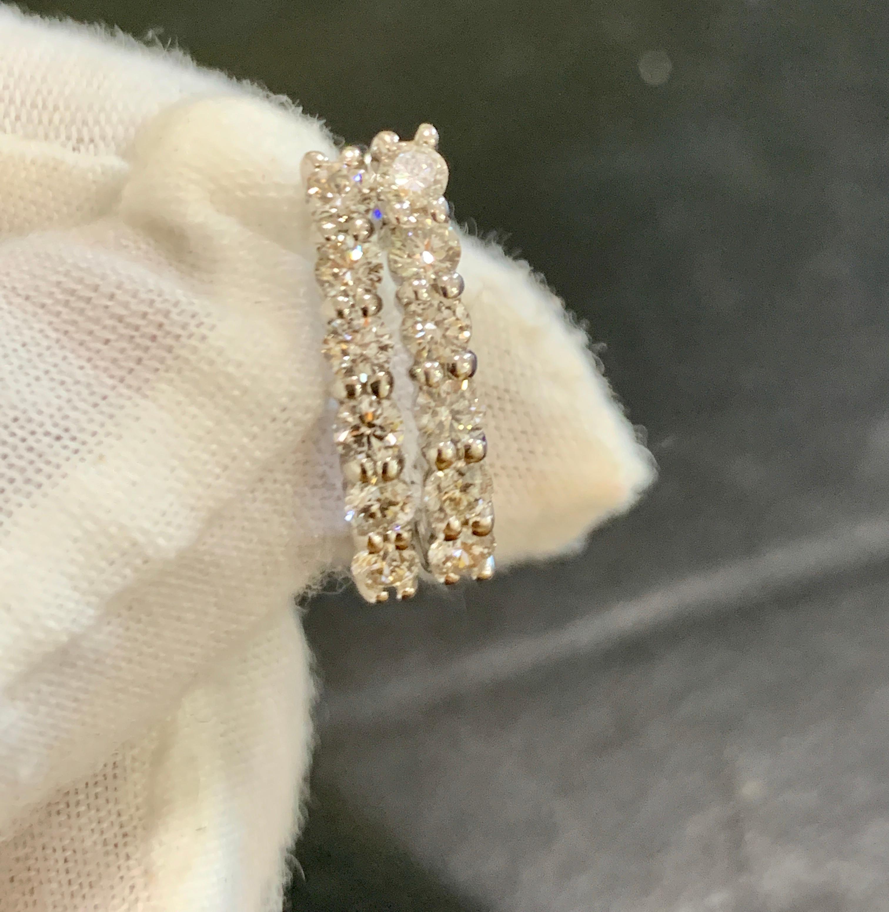 
Designer: Effy
Material: 14k White  gold 
Diamonds: 12 round brilliant cut =Approximately 1.0 Ct total weight 
Front facing huggies
Color: G
Clarity: VS
Weight: 4 Grams
It's a Estate piece so all measurements are approximate.
Please read my reviews