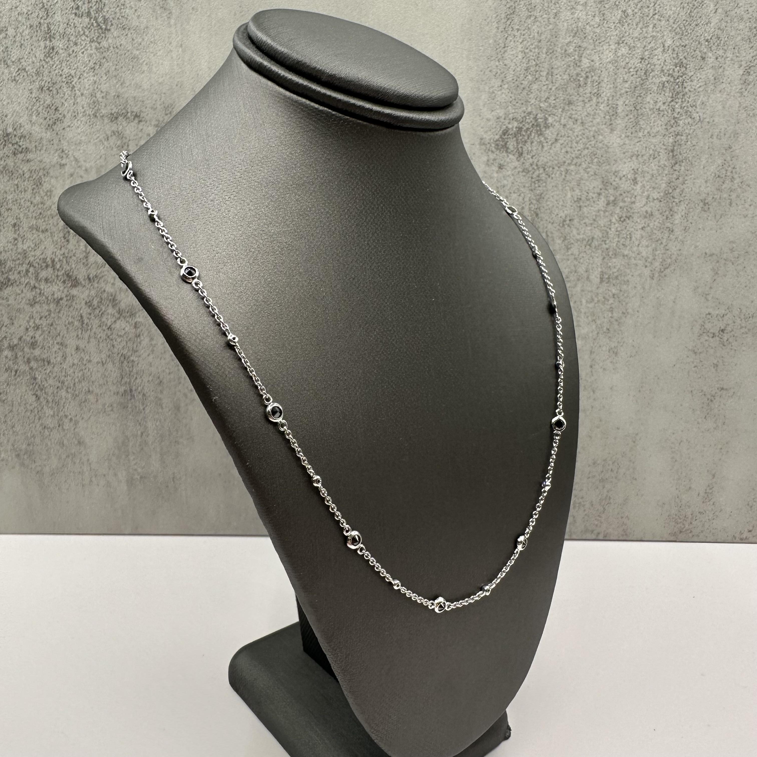 Elevate your jewelry collection with this stunning Designer Effy Diamond Station Necklace, crafted in elegant 14kt White Gold. Featuring 1.20 carats total weight (ctw) of natural black and white GH color, VS/SI clarity diamonds, this necklace