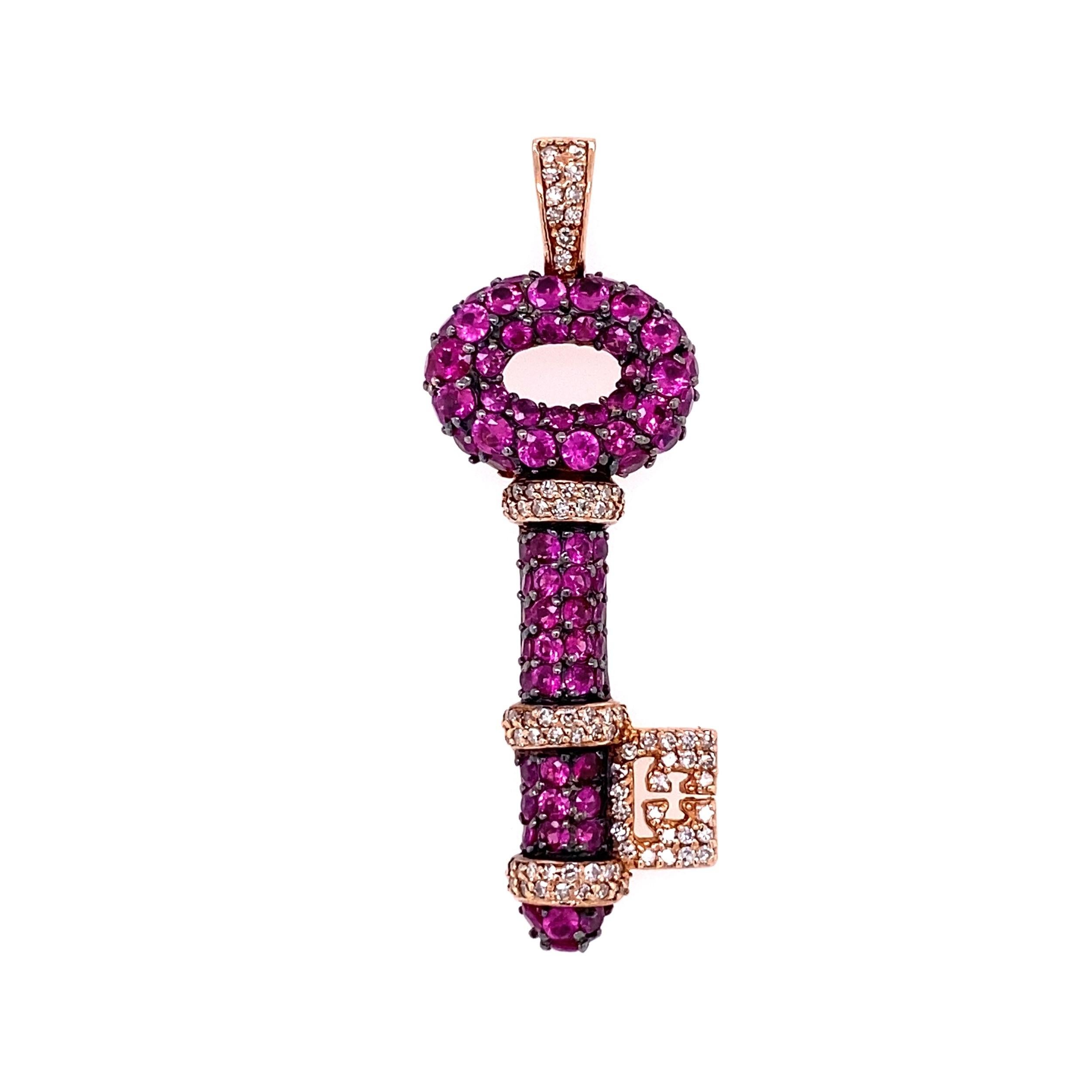 Simply Beautiful! Finely Detailed Designer EFFY Ruby encrusted Open Key Pendant, set with 2.52tcw Rubies, accented by Diamonds, approx. 0.32tcw. Hand crafted in 14 Karat Rose Gold. Dimensions: 1.75” w x 0.60” h x 0.20” d. This pendant epitomizes