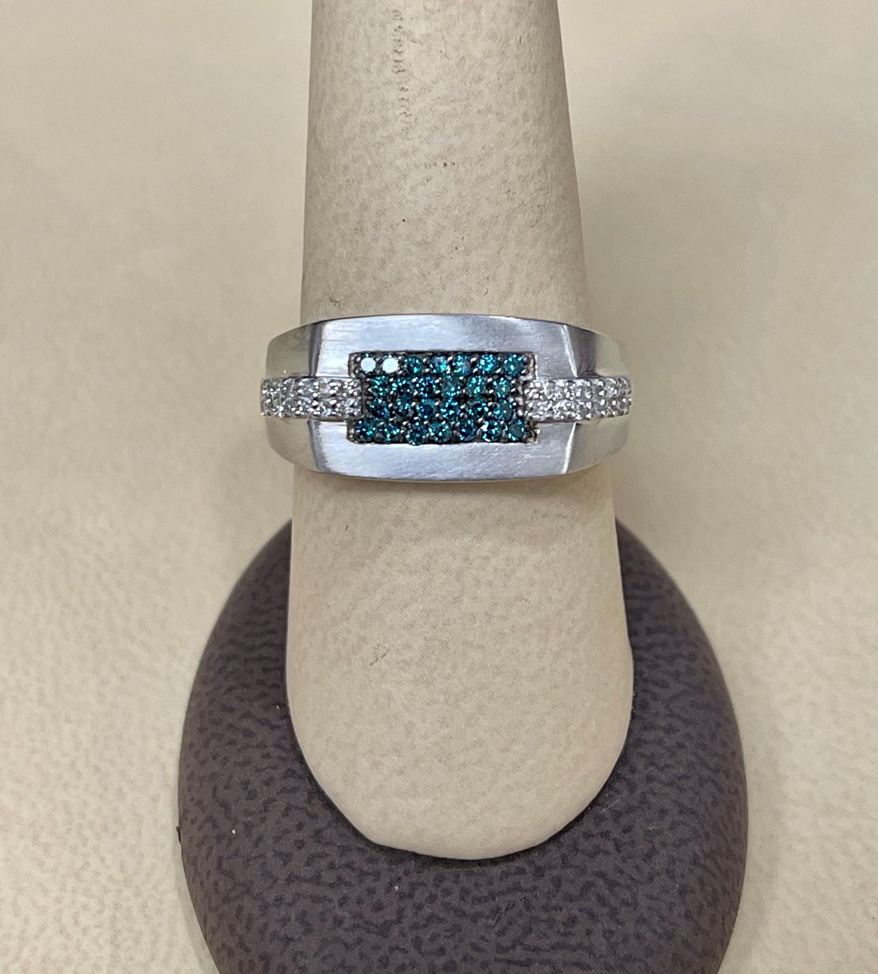 Designer Effy's 0.39 Carat Blue & White Diamond Cocktail Ring 14 Karat White Gold

26 1.3 MM Diamonds 
28   0.5 Pointer

Total 0.39 ct  Brilliant cut round diamonds .


Diamond SI to VS  quality and G/H Color
This is a very affordable ring  from our