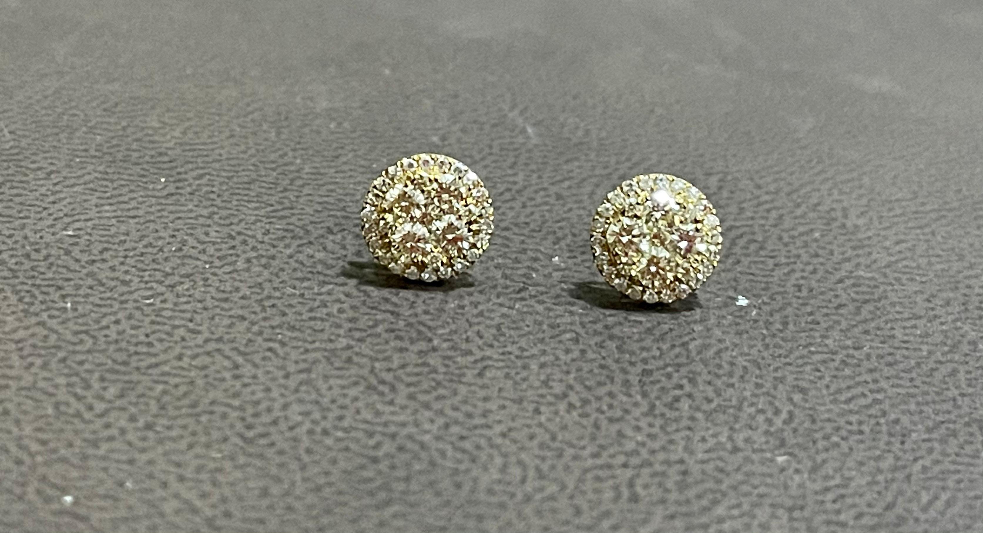 
Designer Effy's 1.08 Carat Diamond  Stud Post Back Earrings 14 Karat Yellow Gold

This exquisite pair of earrings are beautifully crafted with 14 karat Yellow gold .
The center part and Jacket around it can be separated.
one can use the center part