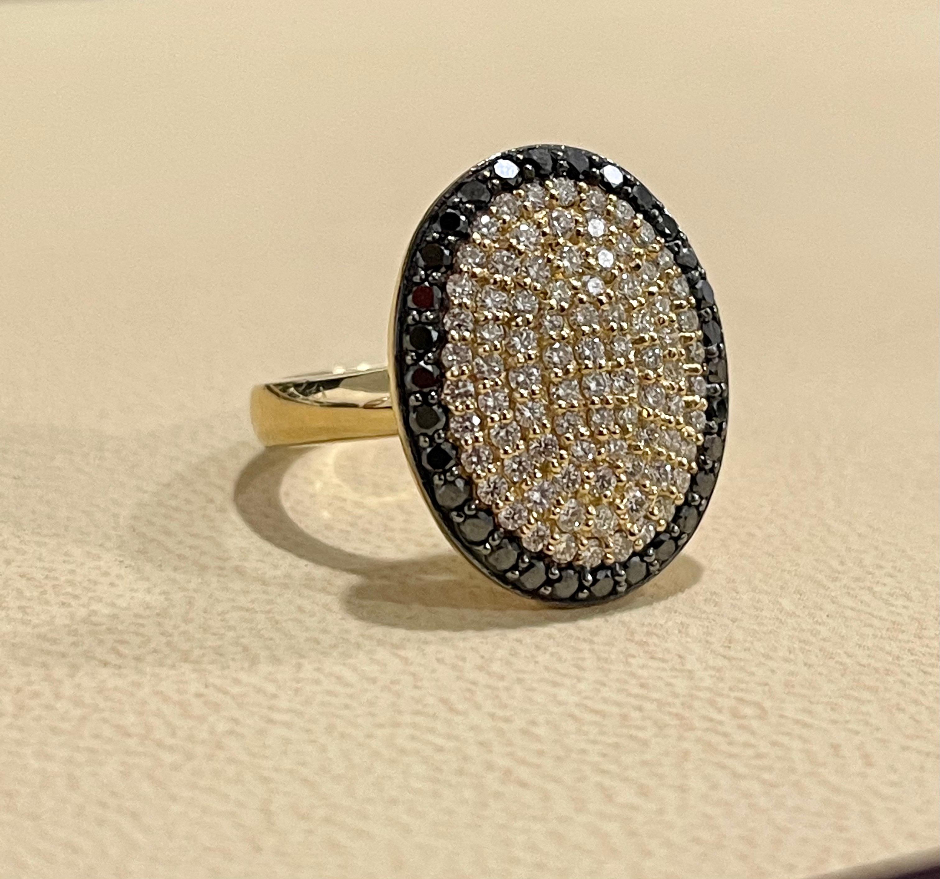 Designer Effy's 1.4 Carat Black & White Diamond Cocktail Ring 14 Kt Yellow Gold
30 1.6 MM Diamonds 
54    one pointer
30 diamonds are 1.25 pointer
Total  1.41 ct  Brilliant cut round diamonds .


Diamond SI to VS  quality and G/H Color
This is a