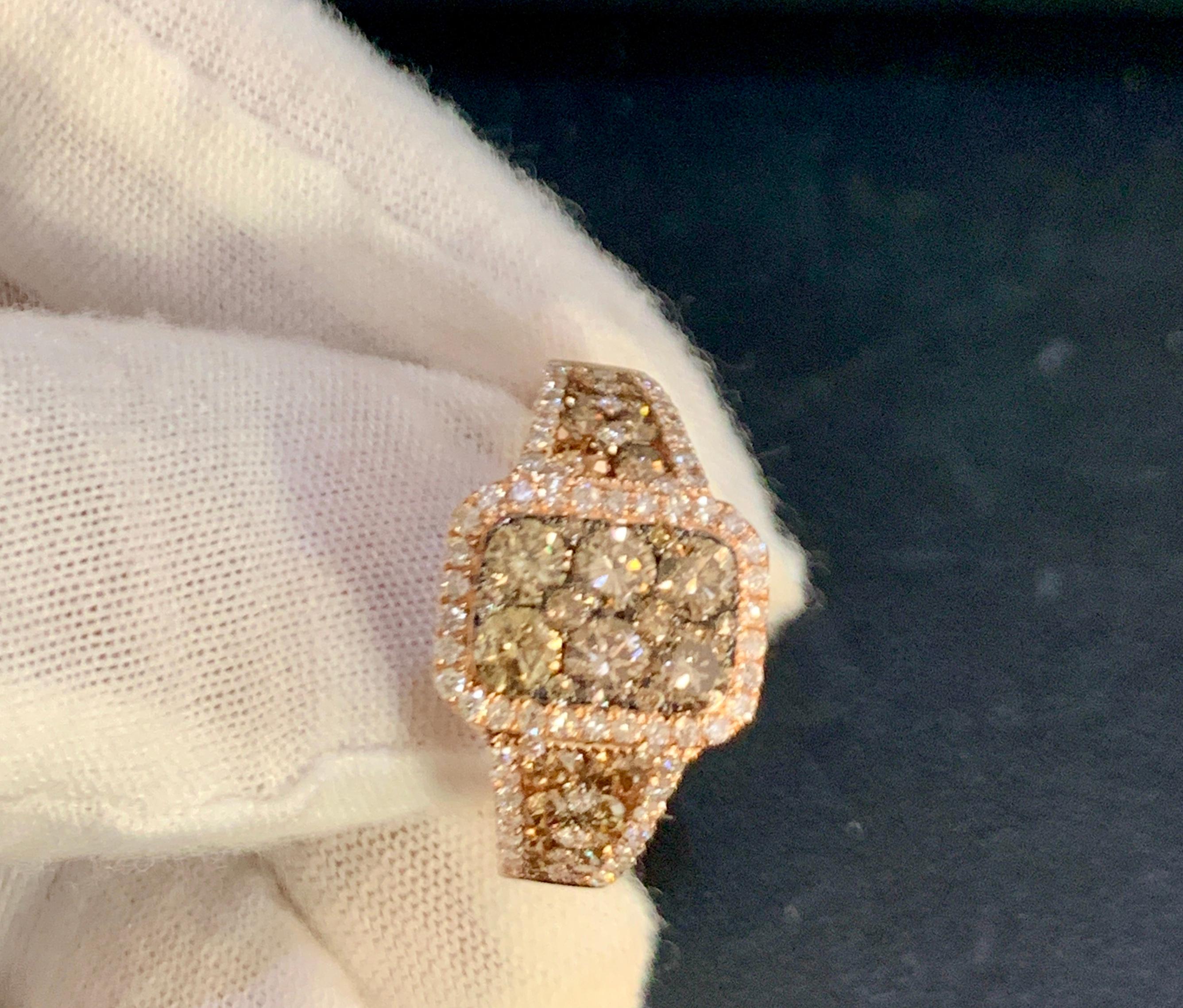  Designer Effy'S 1.8 Carat Diamond  Cocktail Ring 14 Karat Rose Gold Ring
Champagne and White diamond ring in Rose or pink Gold
Total  Approximately 1.80  Brilliant cut round diamonds 
Sparkle is unbelievable.
Diamond SI to VS  quality and G/H