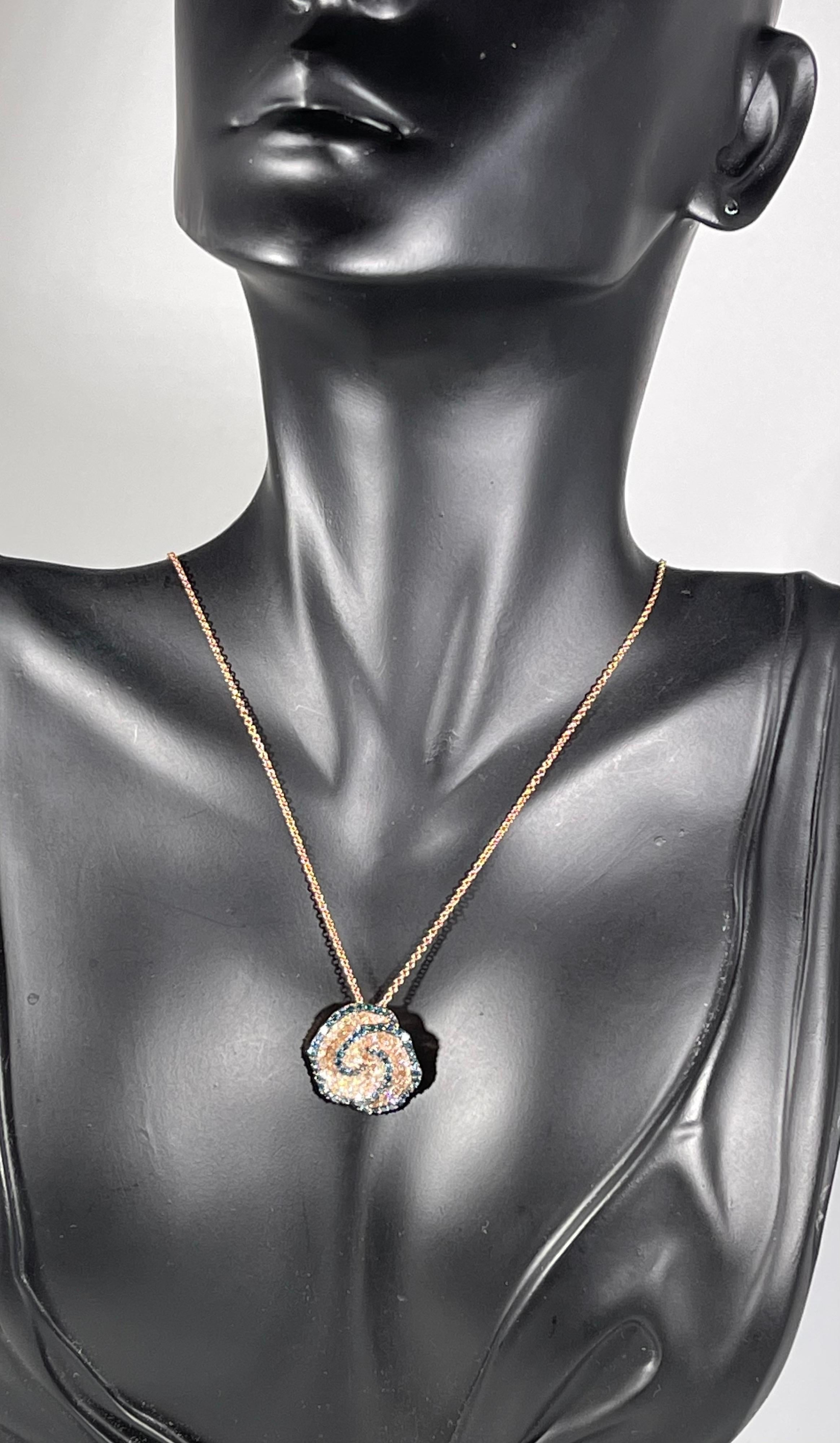 Designer Effy's Blue and White Diamond Celtic Pendant /Necklace 14 K Rose Gold
This spectacular Pendant Necklace  consisting of Blue and White diamonds , all in  round shape .
This listing is only for the pendant.
Total Carat weight of the diamond