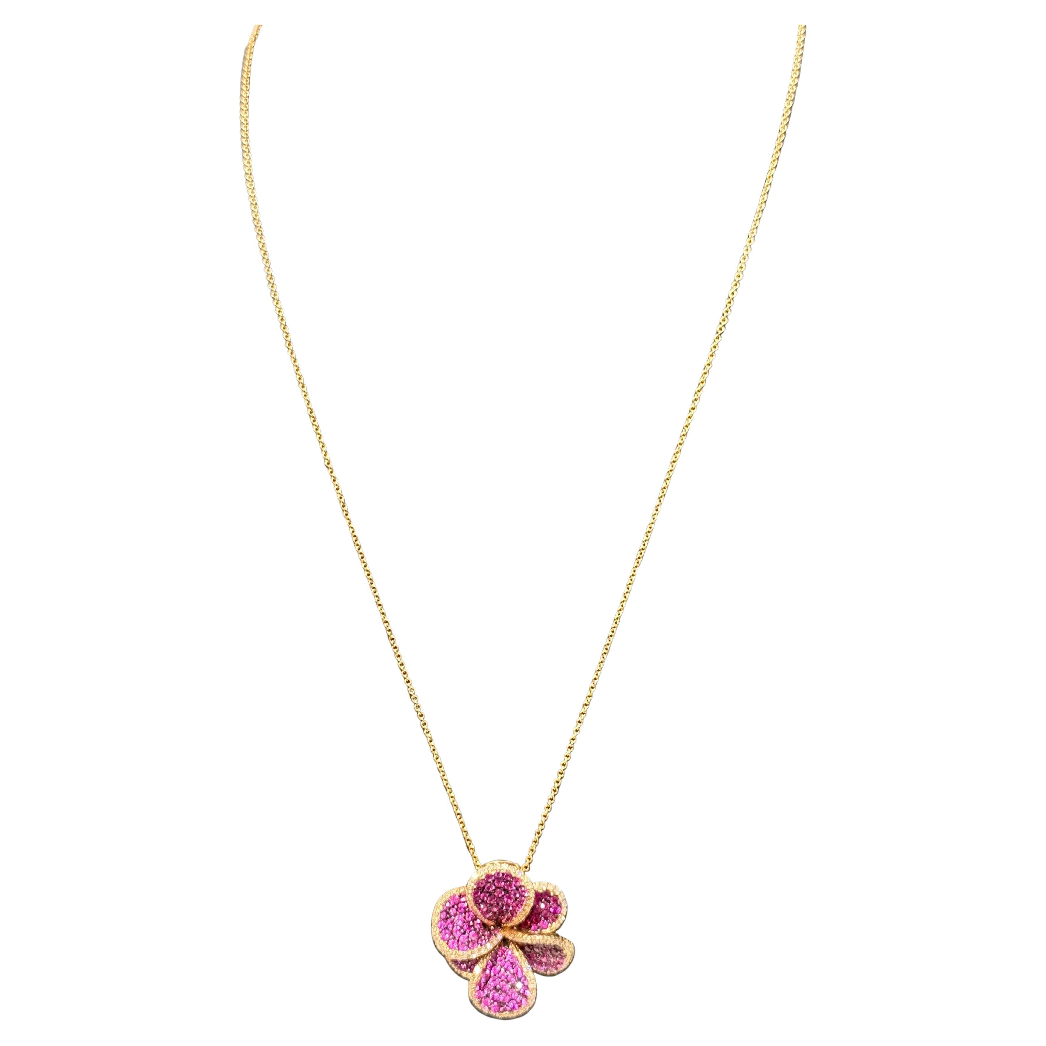 Designer Effy's Natural Pink Sapphire & Diamond Pendant /Necklace 14Kt Rose Gold with 18 Inch Chain

This spectacular Pendant Necklace consisting of 6 petal flower of natural round Pink Sapphire with Black Rhodium and edges of petals are made of