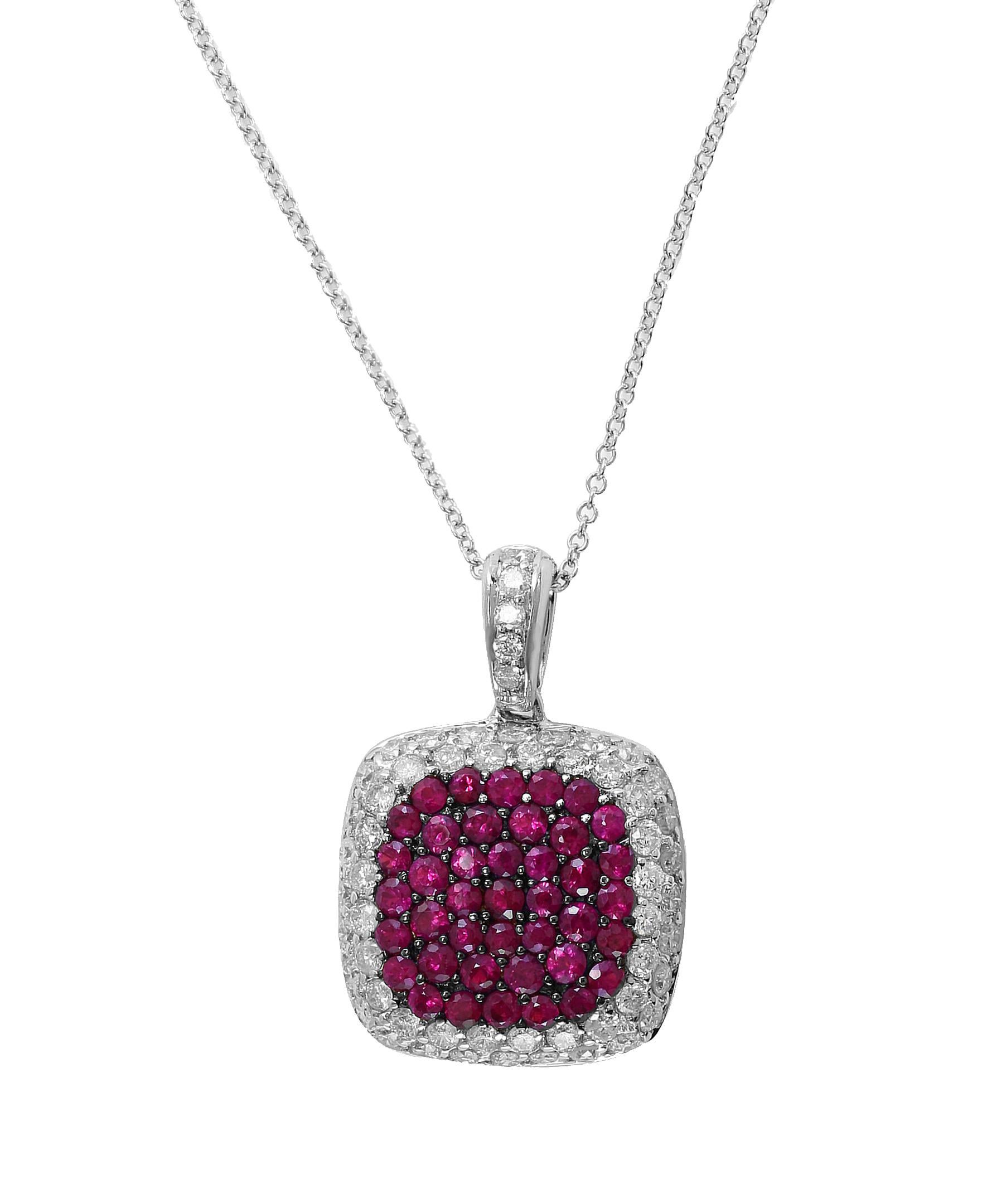 Designer Effy's Natural Ruby & Diamond Pendant /Necklace 14 Karat White Gold with chain

This spectacular Pendant Necklace consisting of 0.43 ct of natural round ruby and 0.57 Carats of brilliant round cut diamonds .
Total Carat weight of the
