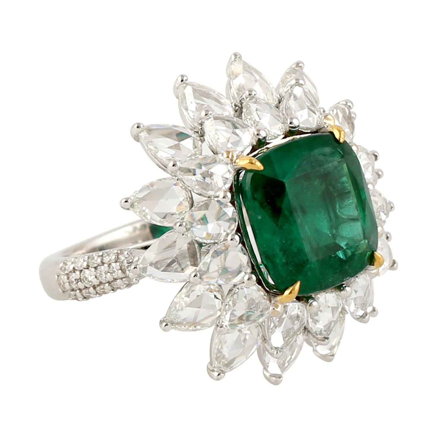 This designer Emerald and White Diamond Ring in 18K white Gold is one of the gorgeous ring we have and is full of charm and uniqueness.

Ring Size: 7 ( Can be sized )

18KT: 6.572gms
Diamond: 4.27cts
Emerald: 4.72cts