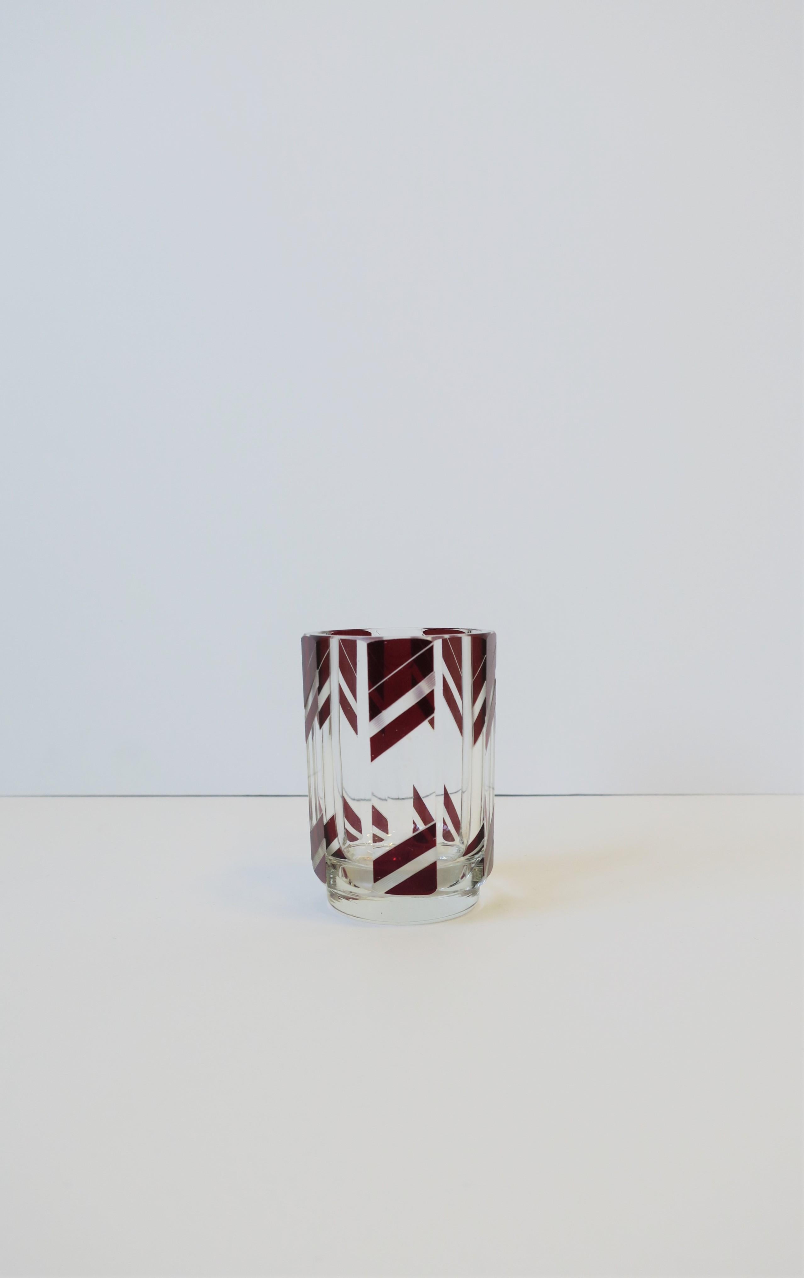 A beautiful and substantial European Art Deco period crystal drinking glass by designer Karl Palda, Czechoslovakia, circa 1930s. This is a very beautiful and substantial water, liquor or spirits crystal glass with a red burgundy enamel over crystal