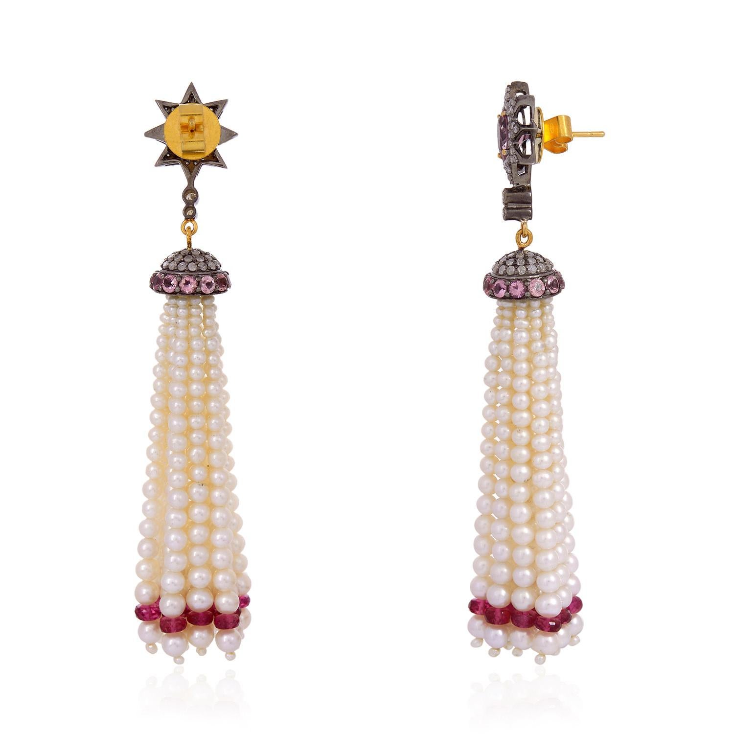 This designer Fresh Water Pearl and Pink Tourmaline Tassel Dangle Earring in 18K Gold and silver with Diamonds would make your heart miss a beat. This earring is full of happiness and love.

Closure: Push Post

18KT