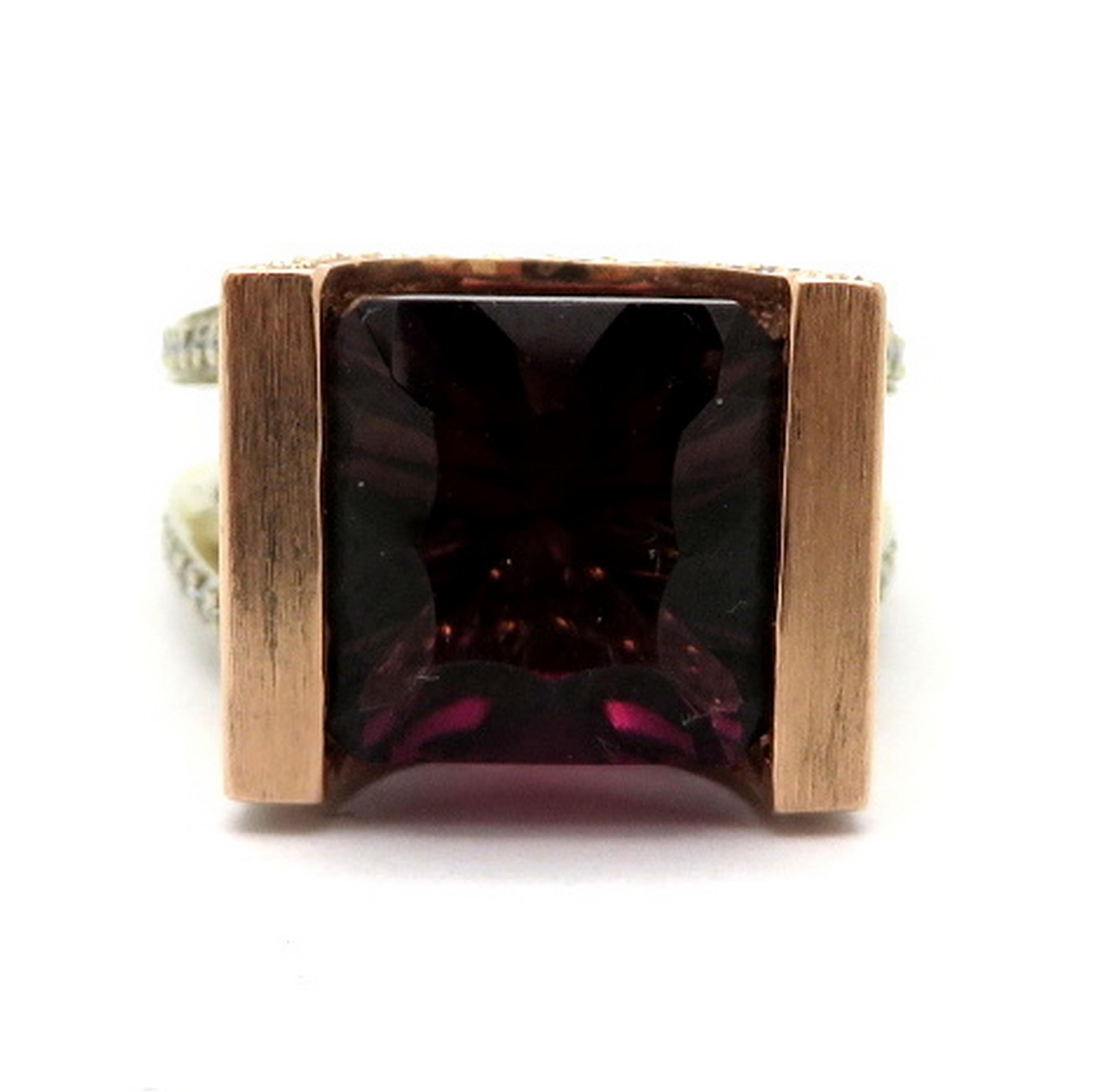 Designer Gauthier 7.00 carat tourmaline and diamond fashion statement ring. Showcasing one fancy square cut tourmaline, channel set, accented with numerous round brilliant cut diamonds, pave set, weighing approximately 2.75 carats total. Diamond