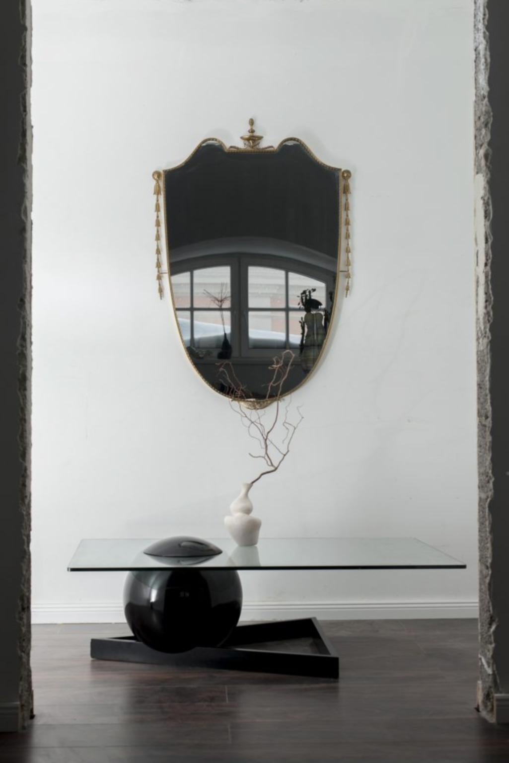 Designer Gio Ponti style antique Italian mirror.

This is a piece of history and just a pure touch of Italian glamour to your home.

Mirror is not just a functional piece, but a work of art that will become a focal point in any space. Hang it in