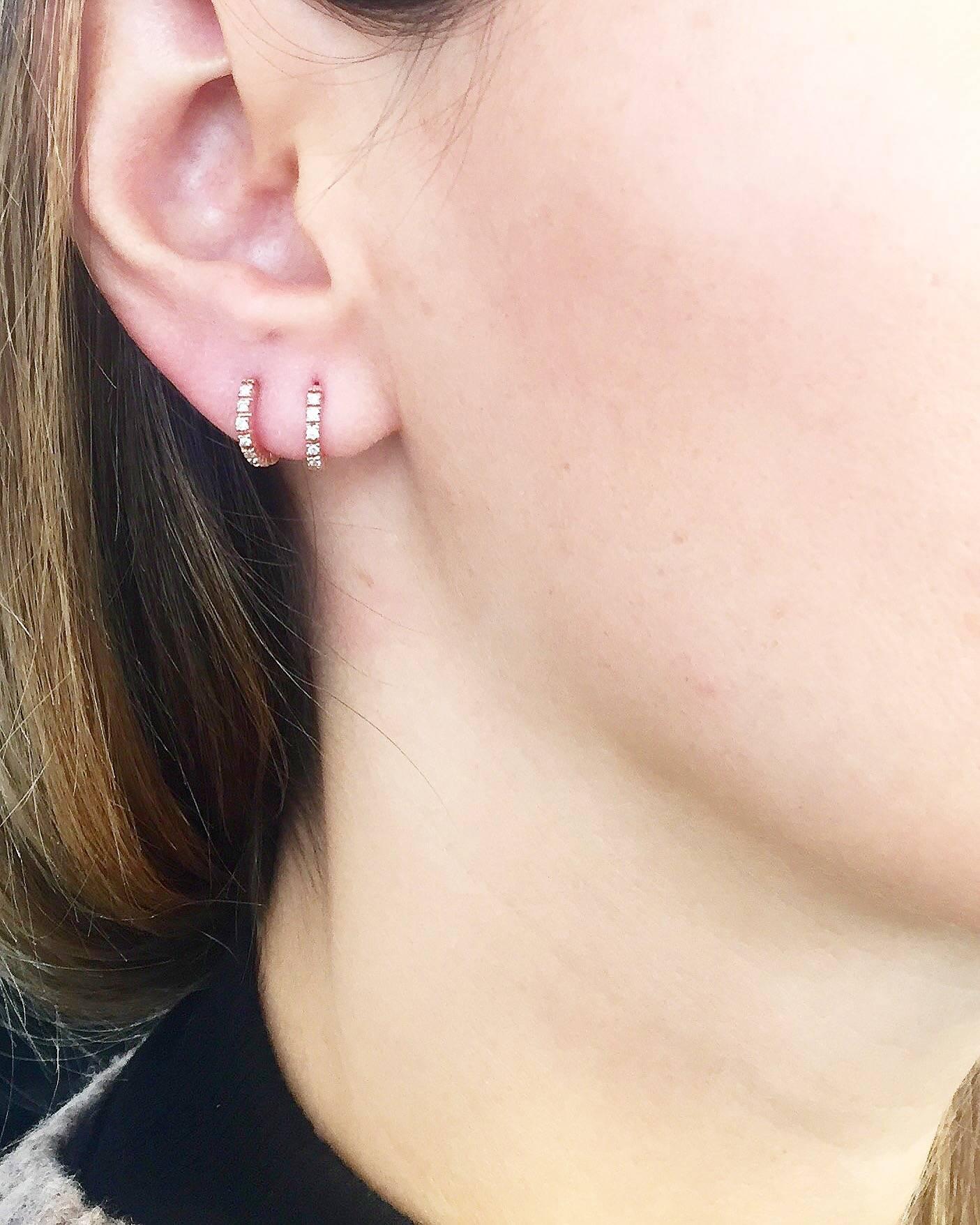 This hoop earring are made in Italy of 18k rose gold and embellished with 0.05 carats of sparkling round brilliant cut diamonds. The delicate size makes it perfect for every day and to match with everything.

This earring are from our own