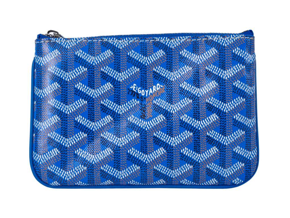 Goyard Classic Mini Senat Pouch in blue coated canvas for sale. Detailed with Goyard's iconic Goyardine monogram and silver hardware. An unworn piece.
Colour
Blue
Material
Leather coated canvas
Hardware
Silver
Condition
New
Height / Width/ Depth
10