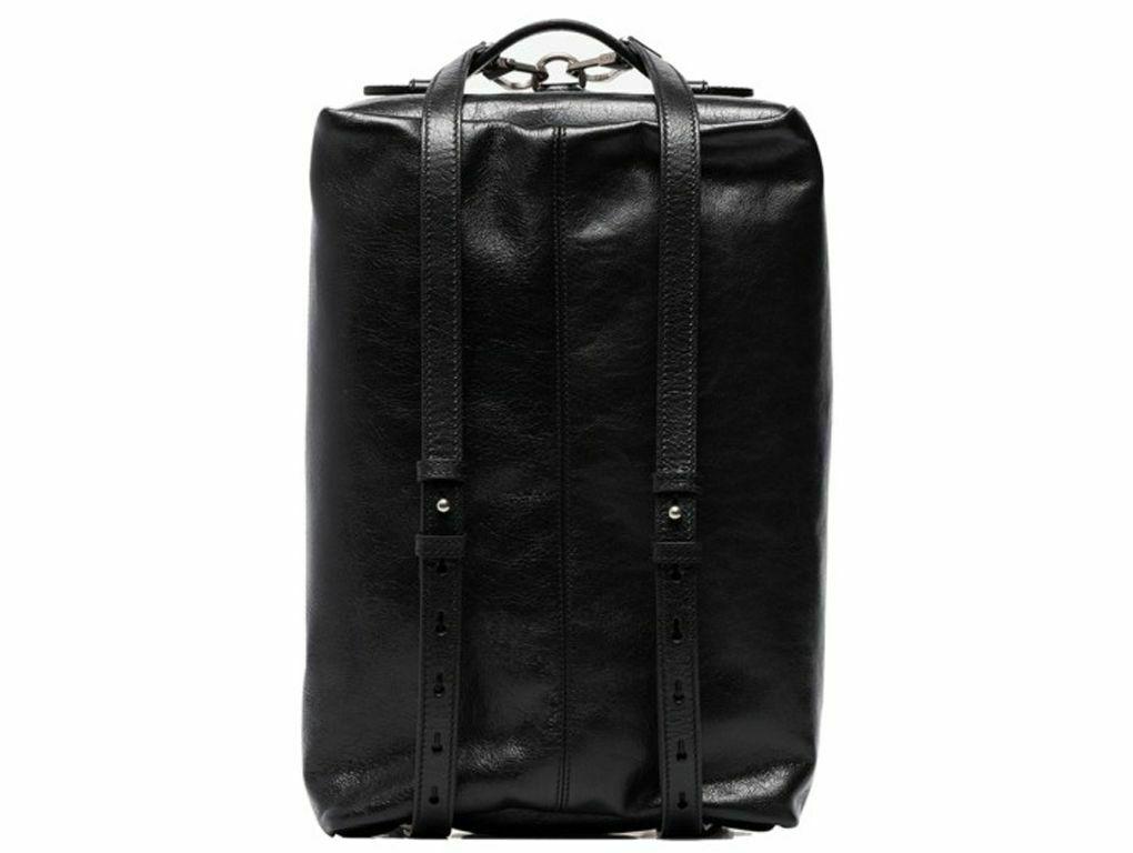 Great bag by Gucci – the Morpheus Duffle Bag. The additional side top handle means that the style can be worn as a long tote, while the shoulder straps can also be doubled, transforming this backpack into a duffle. The leather is specially treated