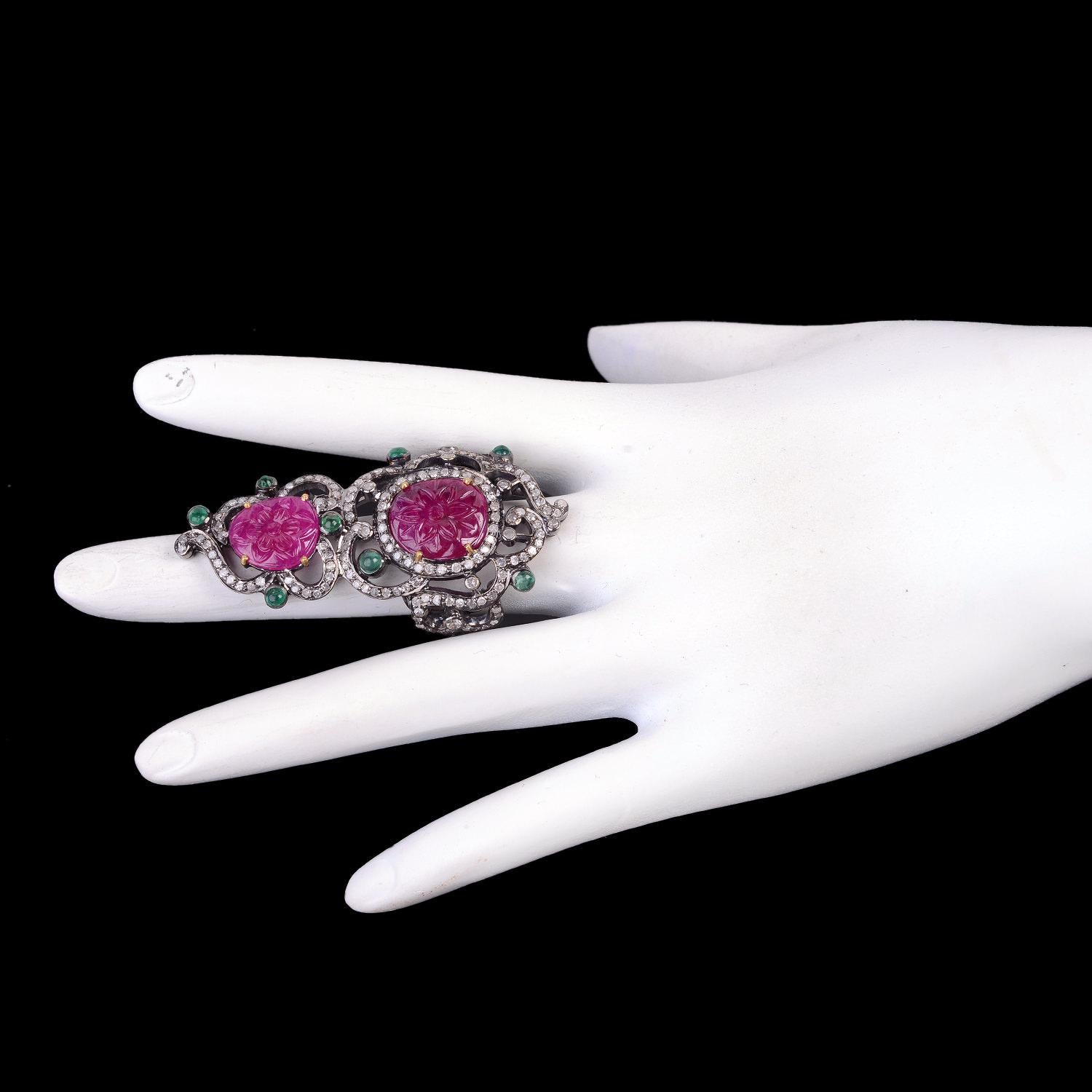 One of a Kind this Designer Hand Craved Ruby Ring with Diamonds and Emeralds in Gold and Silver is lovely for any occasion.

Ring Size: 7 ( Can be sized )

18kt Gold:2.3gms
Diamond:2.01cts
Slver:8.5gms
Emerald:0.60cts
Ruby:7.20cts
