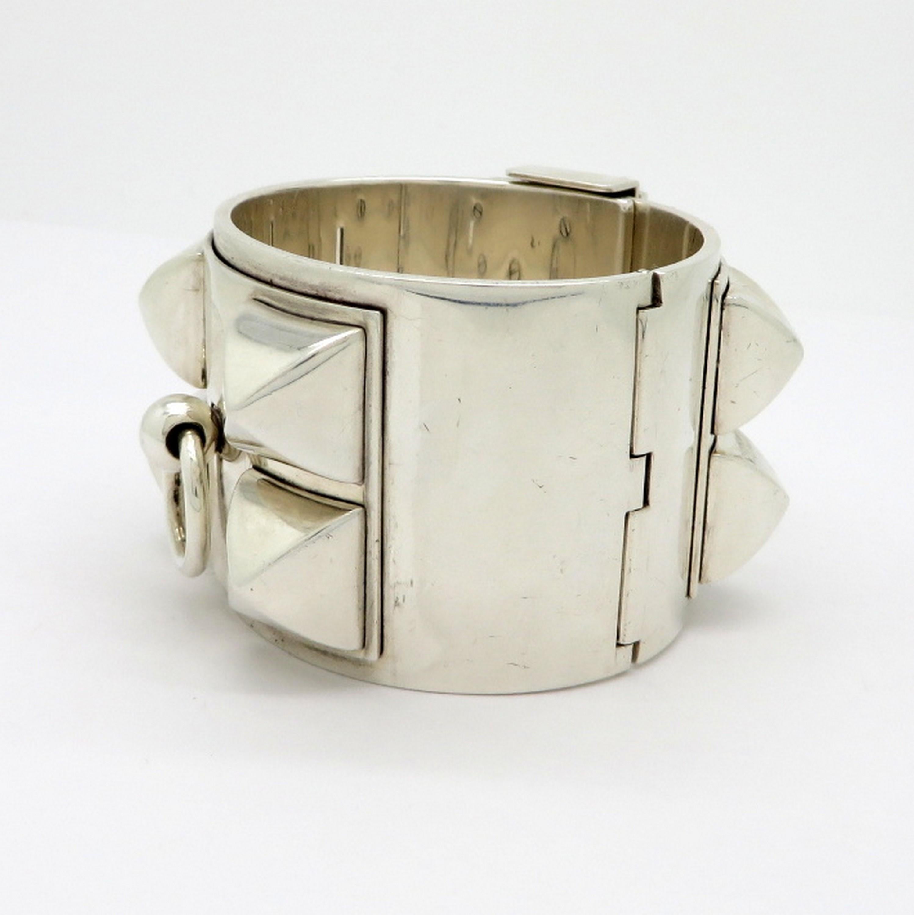 Designer Hermes Collier de Chien cuff bangle bracelet.  Size SH #13B14441.  The designer Hermes box and pouch are included. Hallmarked: Hermes made in Germany Ag 925 AD SH 13B14441.  The bracelet itself measures 39 mm wide and the inner bracelet