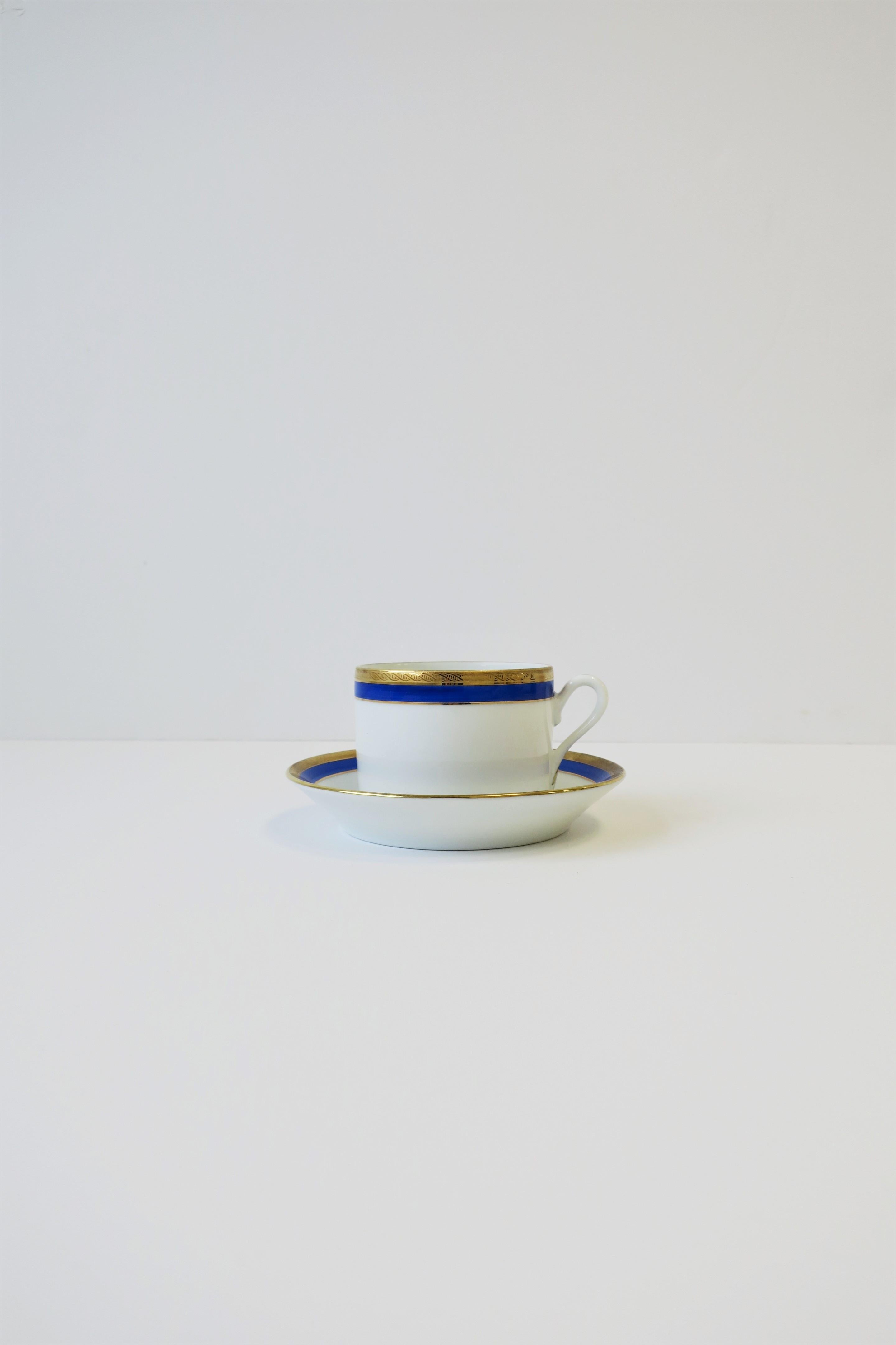 A very beautiful mid-20th century Italian white porcelain, cobalt blue and gold gilt, coffee or tea cup and saucer by designer Richard Ginori, Italy. Colors include, cobalt blue, gold and white porcelain. With maker's mark on bottom as show in image