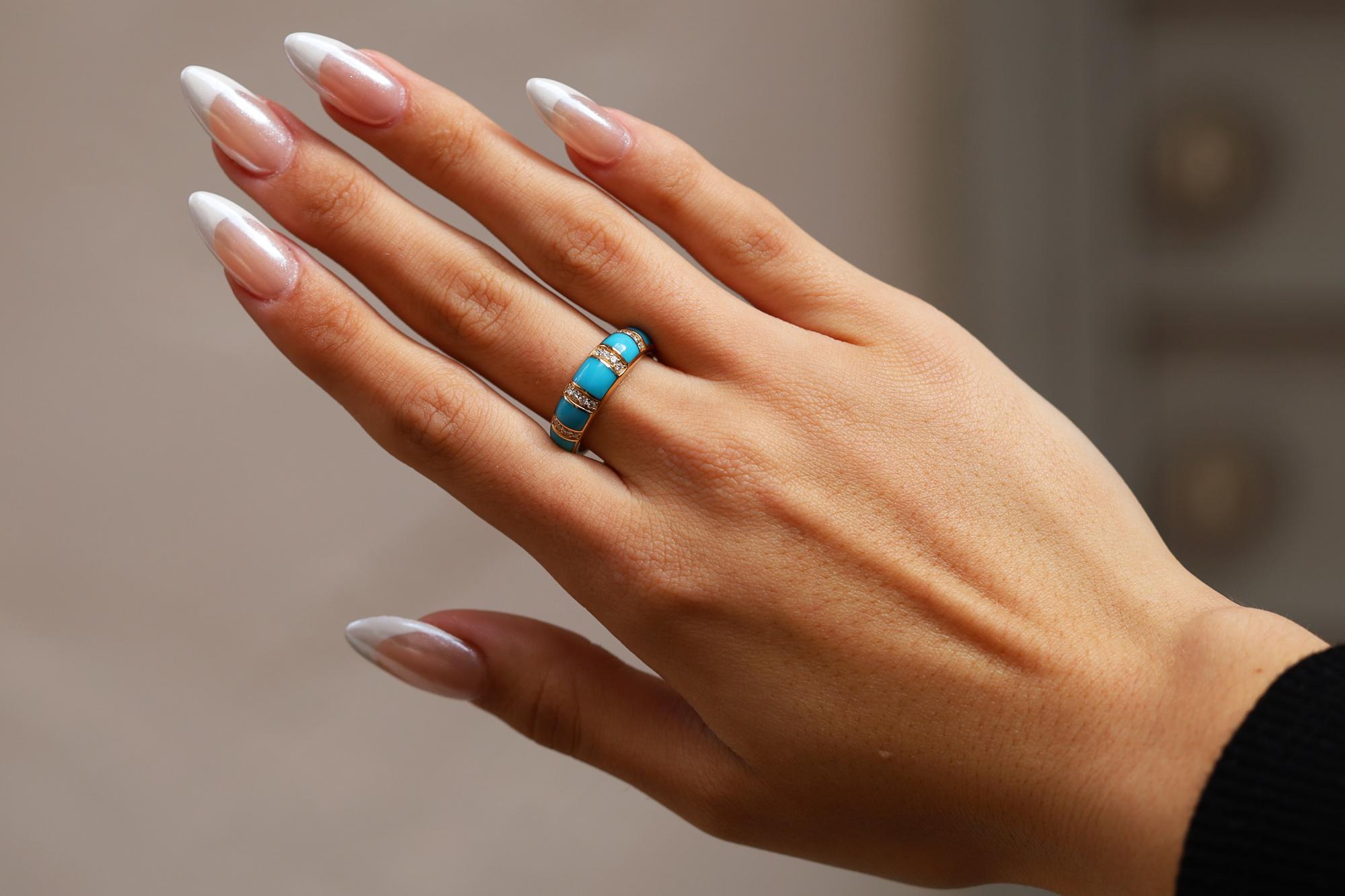 A wedding band or stacking ring to be worn with joy and pride, this sleek, sleeping beauty turquoise band is a must have accessory. Created by Kabana, renowned for their fabulous gemstone inlay work in rich 14k yellow gold and brilliant diamonds.