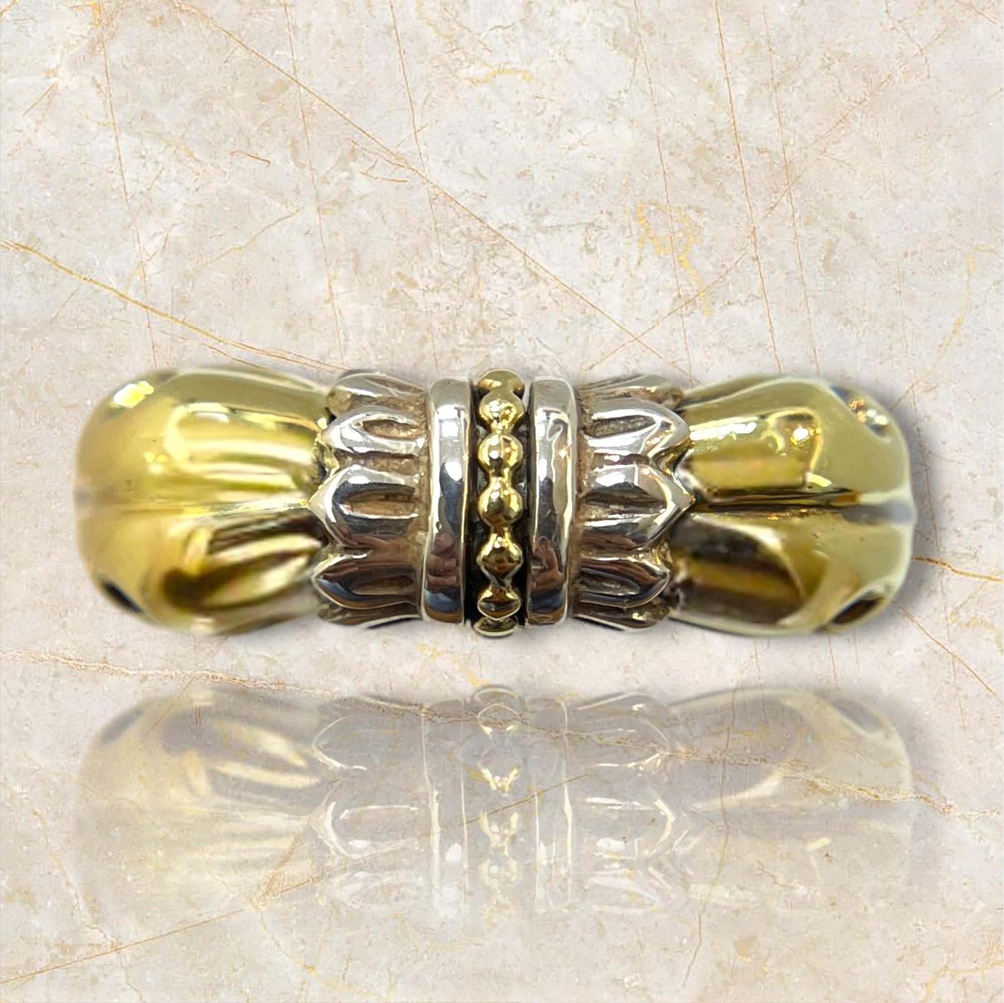 Elevate your style with this stunning Lagos Caviar ring, crafted with a unique blend of 18k gold and sterling silver. The intricate Caviar beading design adds a touch of elegance and sophistication, making it perfect for any occasion. Its luxurious