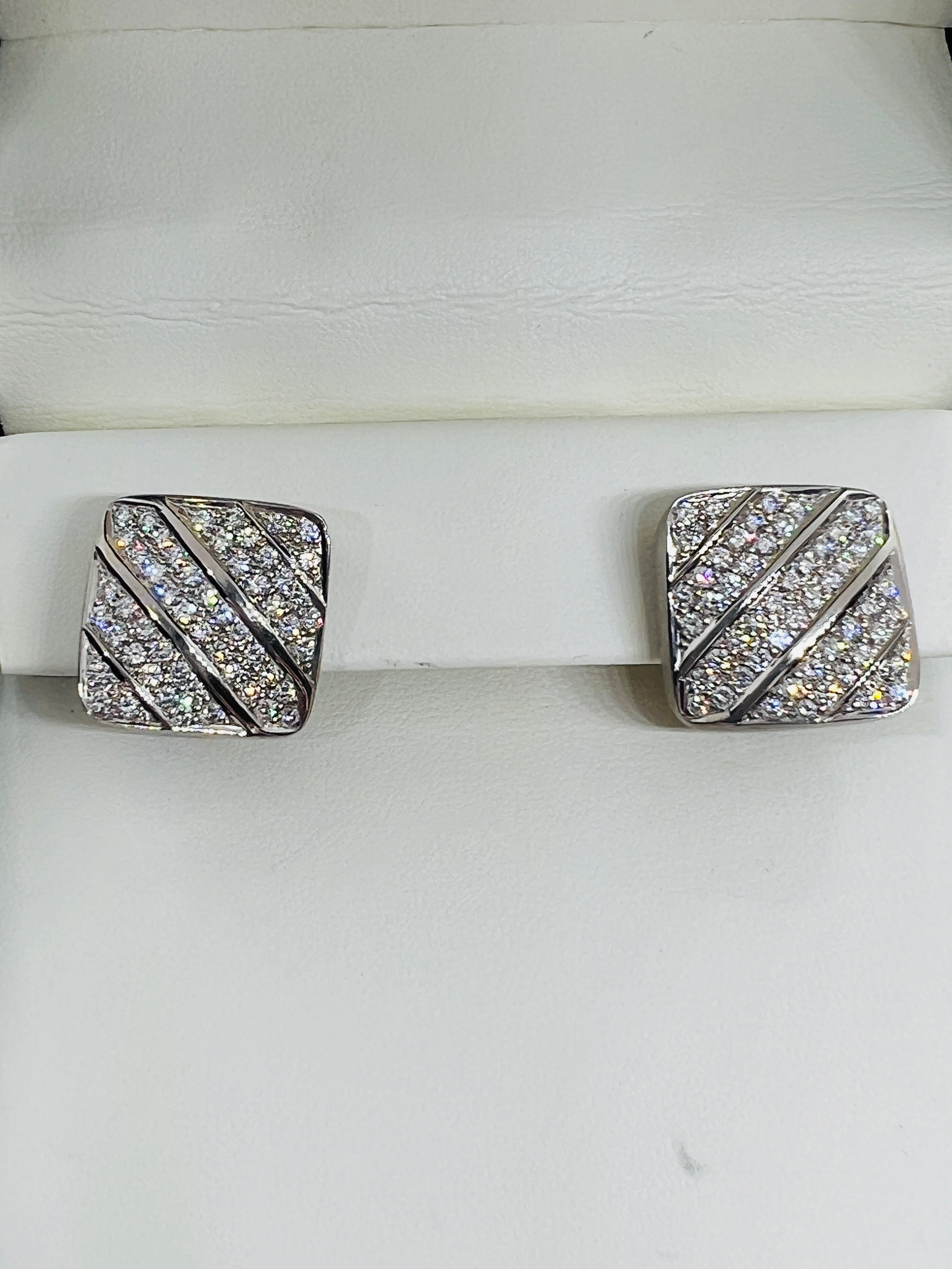 Gorgeous Designer Marlene Stowe 18K White Gold and Diamond square earrings. These earrings boast 108 gorgeous diamond with an estimated total carat weight of 3 carats. These measure three quarter inch square and weigh 19.1 grams. These feature a