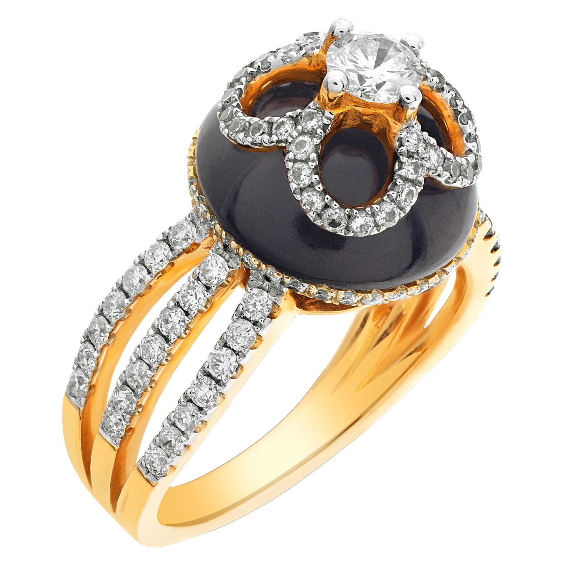 Designer Michael Christoff diamonds ring set in 18k rose gold. The top of the ring gives a spidery effect on a black agate. Diamond center  approx 0.24 carat. All around 112 diamonds, total approximative weight: 0.74 carat.  All round diamonds are