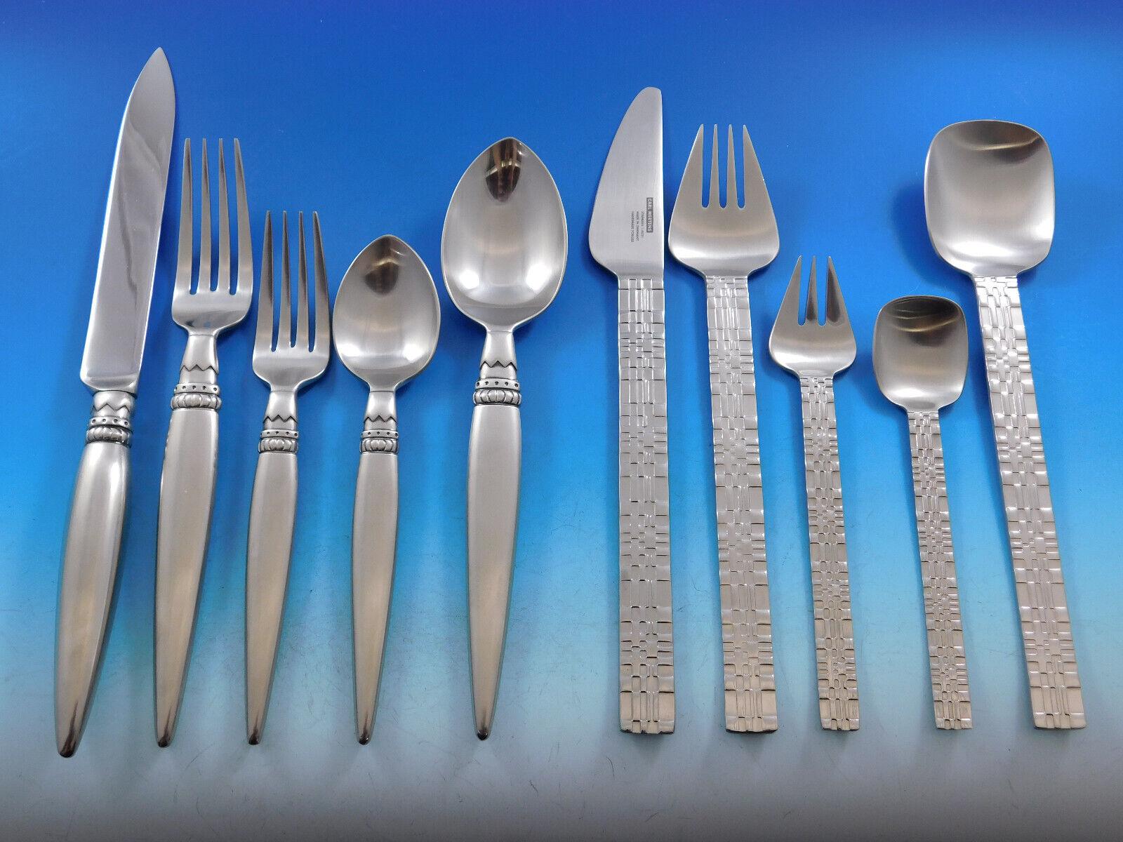 Fabulous high quality Modern designer patterns in a unique mixed stainless steel flatware service for 12 - 62 pieces total. 

This set includes one 5-piece place setting (1 dinner knife, 1 dinner fork, 1 salad fork, 1 teaspoon, and 1 dinner spoon)