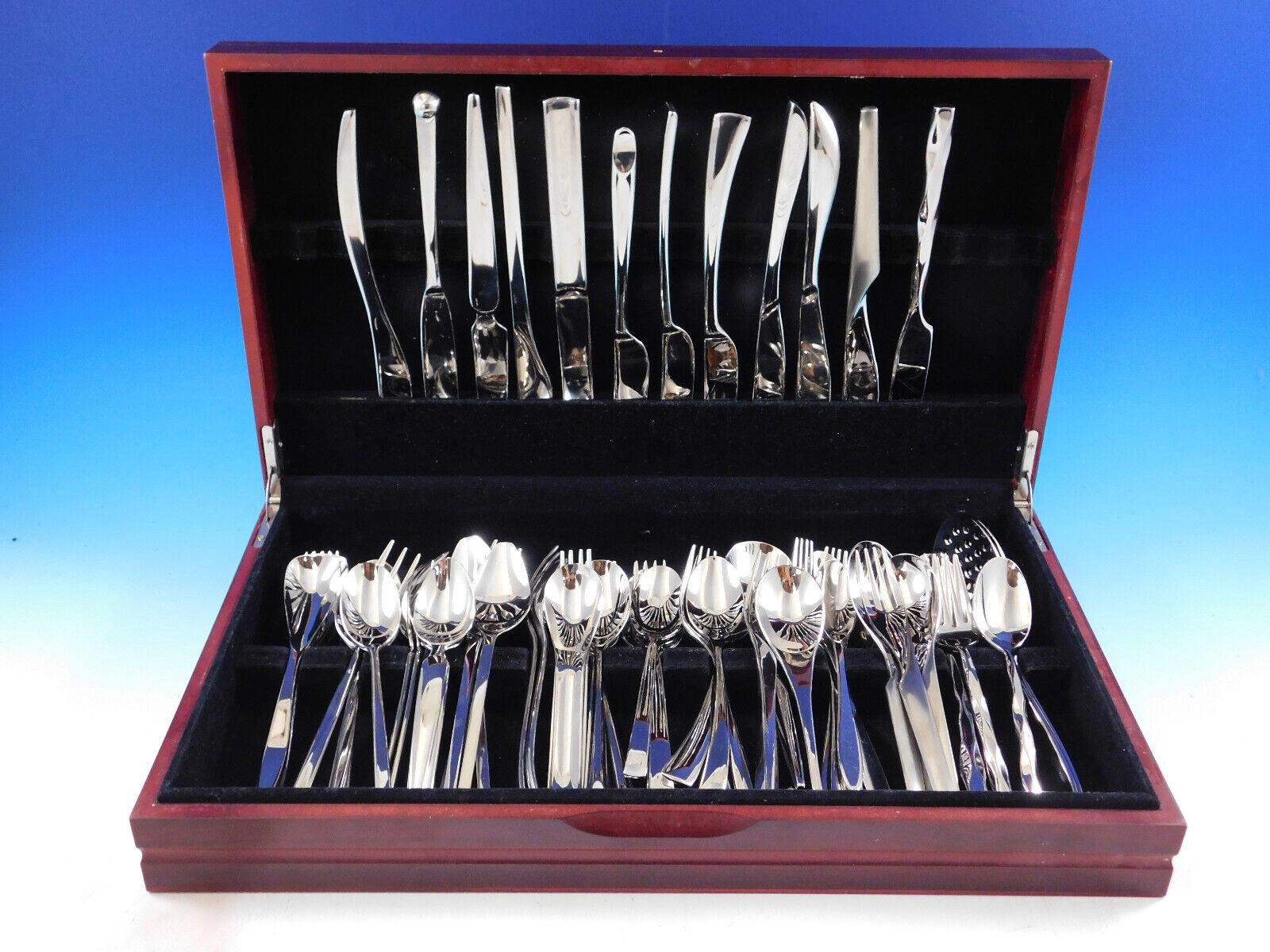 Fabulous high quality Modern designer patterns in a unique mixed stainless steel flatware service for 12 - 62 pieces total. 

This set includes one 5-piece place setting (1 dinner knife, 1 dinner fork, 1 salad fork, 1 teaspoon, and 1 dinner spoon)