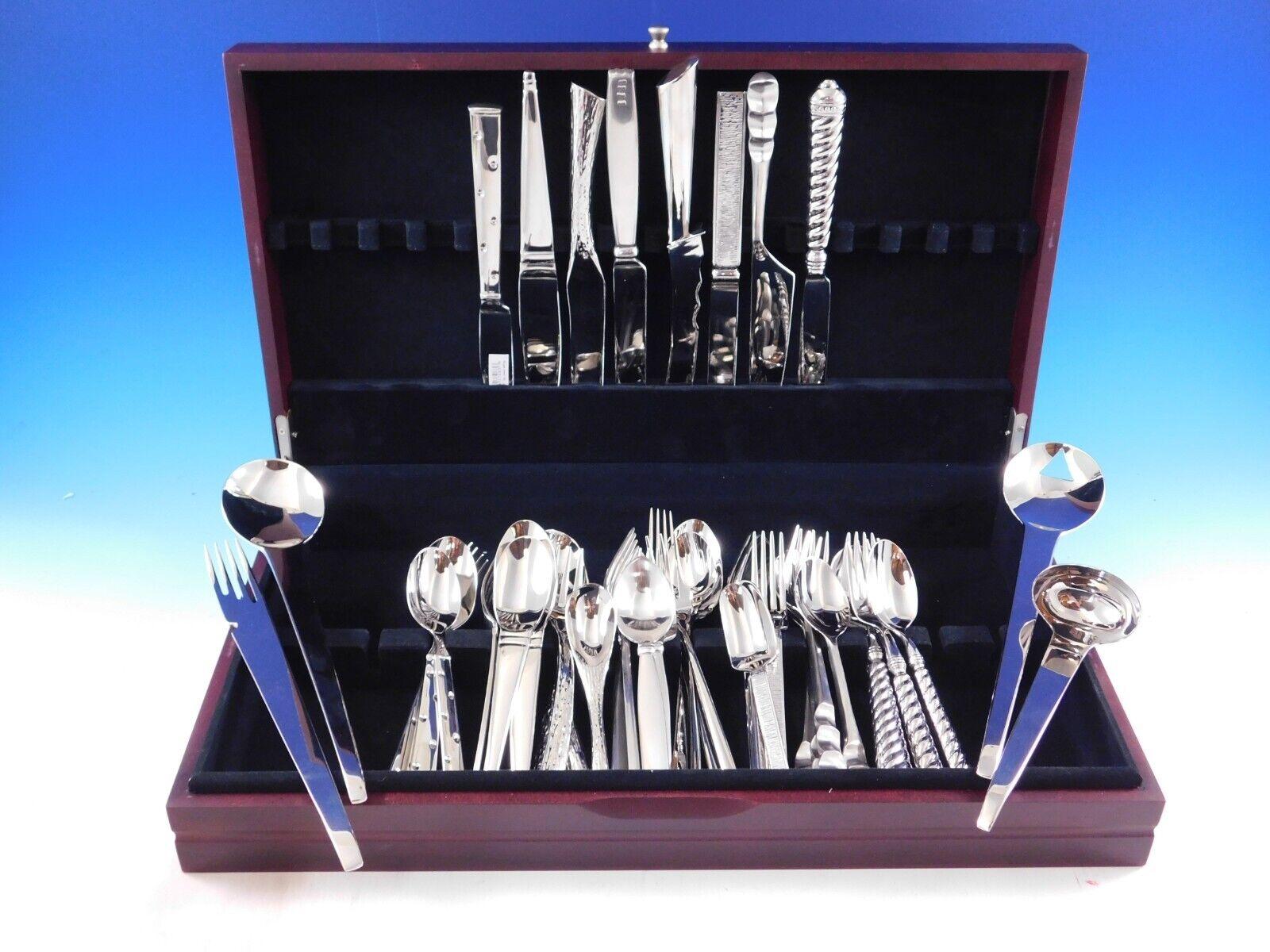 Awesome high quality Modern designer patterns in a unique mixed (harlequin) stainless steel flatware service for 8  - 44 pieces total.

This set includes one 5-piece place setting (1 dinner knife, 1 dinner fork, 1 salad fork, 1 teaspoon, and 1