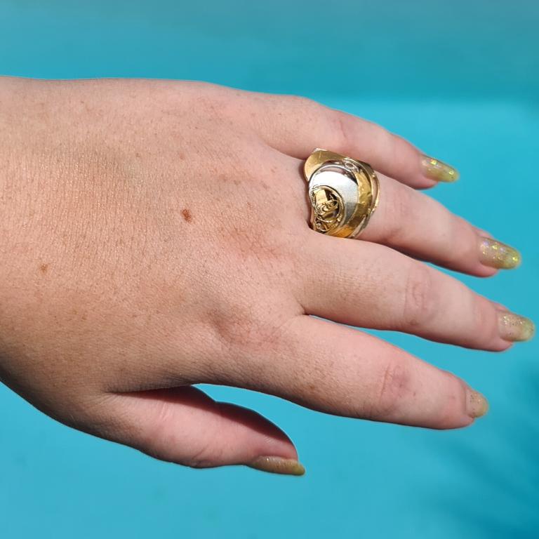 This nautical one-of-a-kind silver and gold contemporary designer filigree sailing ring is handcrafted by international award-winning Tara Lois, whose sought after sculptural jewellery has featured in fashion magazines including British Vogue and