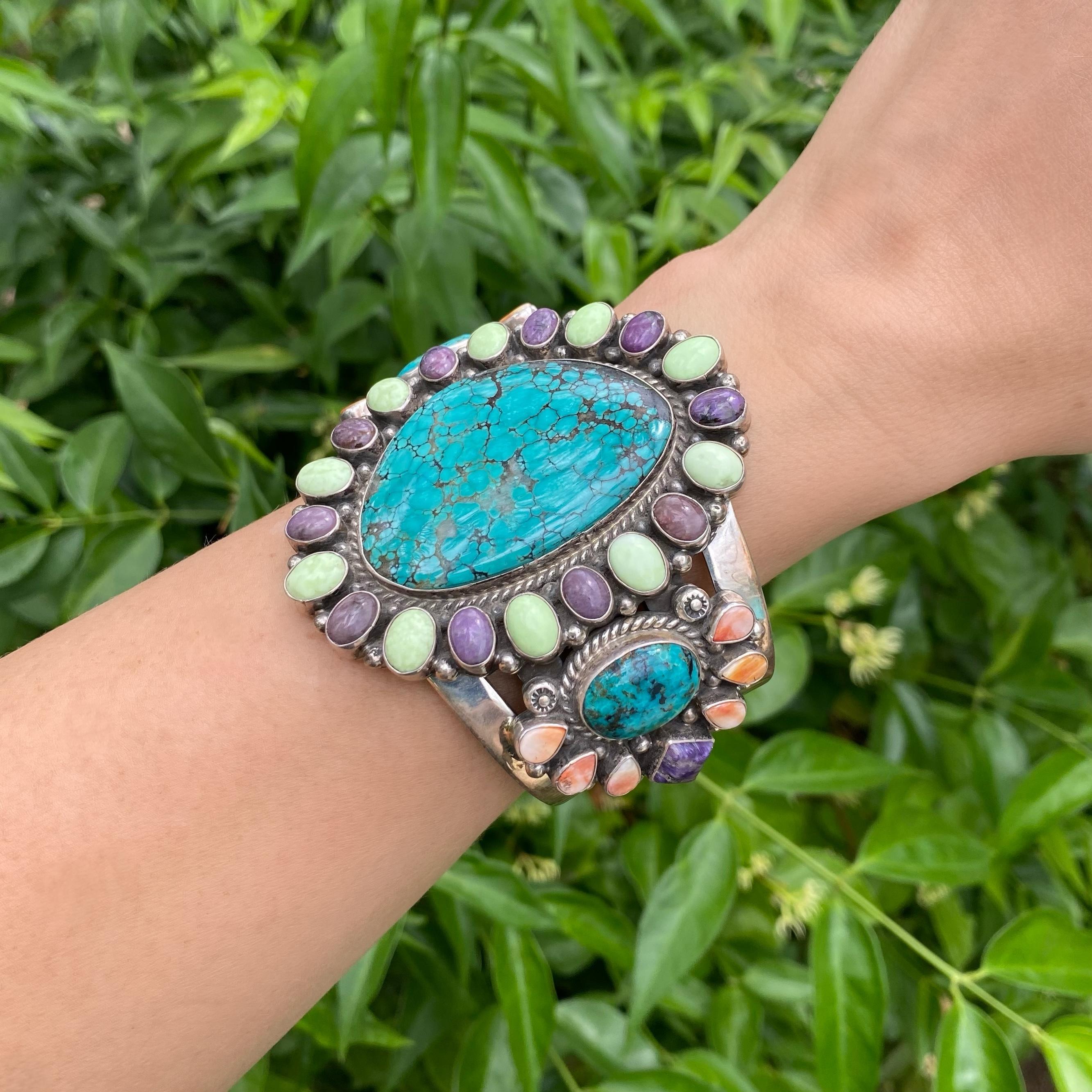 Stunning Highly Desirable Native American Navajo 925 Sterling Silver Large Cuff Bracelet featuring Turquoise, Sugilite, Spiny Oyster and Gespeite in beautifully Hand crafted Sterling Silver frame. Marked: Sterling Lee Bennett. Dimensions: 3.38” w x
