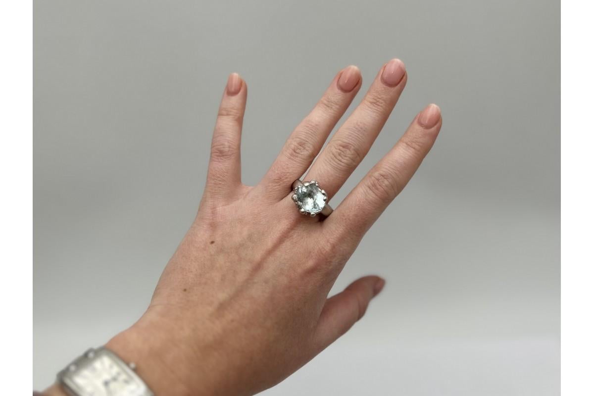 Designer handmade ring in 18-carat white gold by Charlotte Lynggaard.

Set with large natural aquamarine 15x12mm and small diamonds with a total weight of 0.08ct

The Ole Lynggaard Copenhagen brand has been on the market since 1963. It was founded