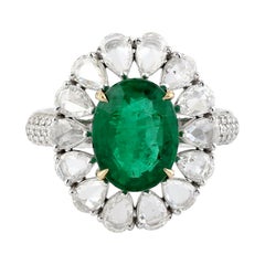 Designer Oval Shape Zambian Emerald Ring with Pear Shape Diamonds in 18K Gold