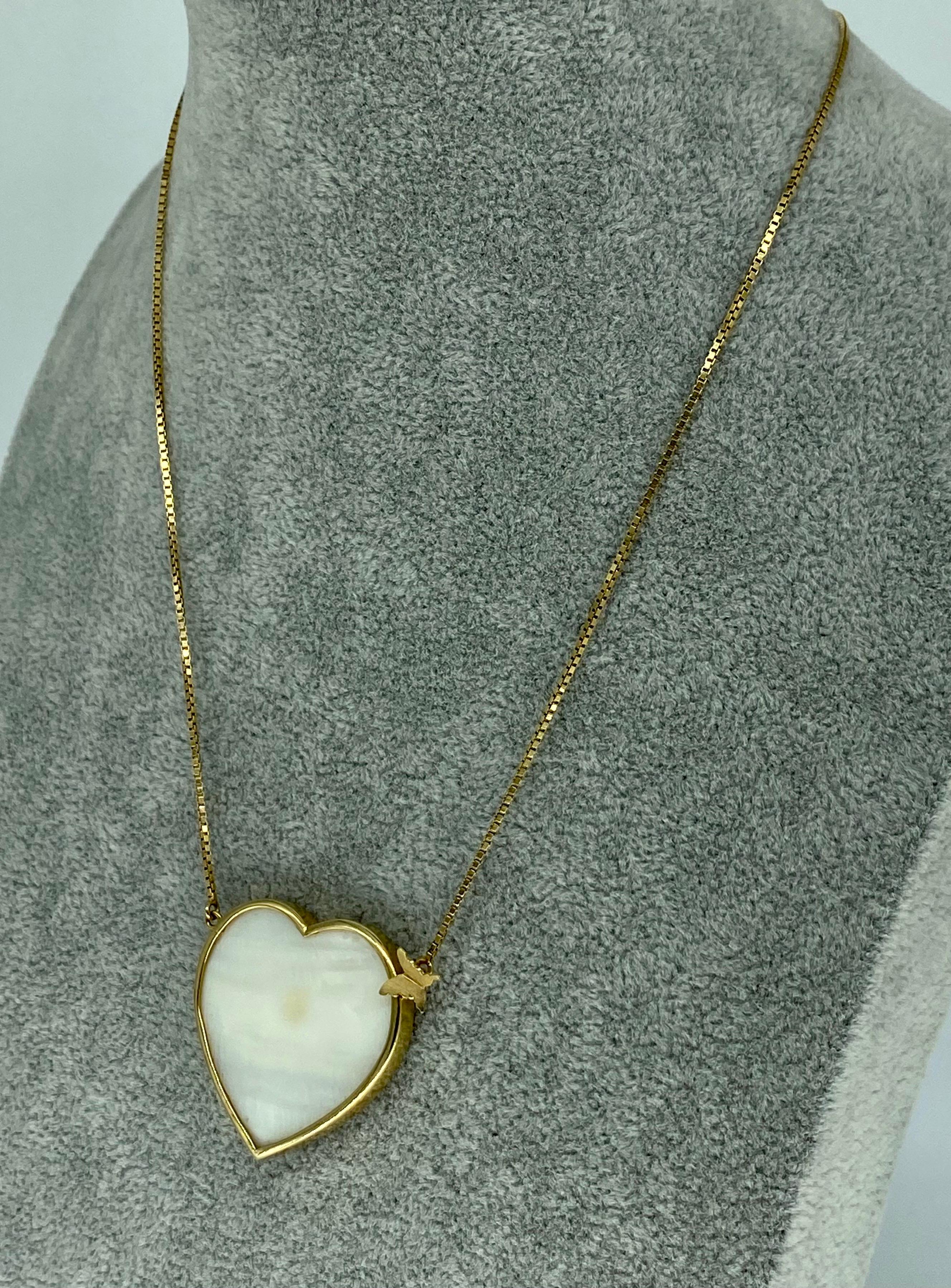 Designer Patricia Jias 2’x2’ Big Pearl Heart Butterfly Bow Tie Necklace. Famous designer from Brazil is back again with another outstanding necklace piece. The necklace features a big pearl heart cut stone measuring 2 inch by 2 inch. The necklace