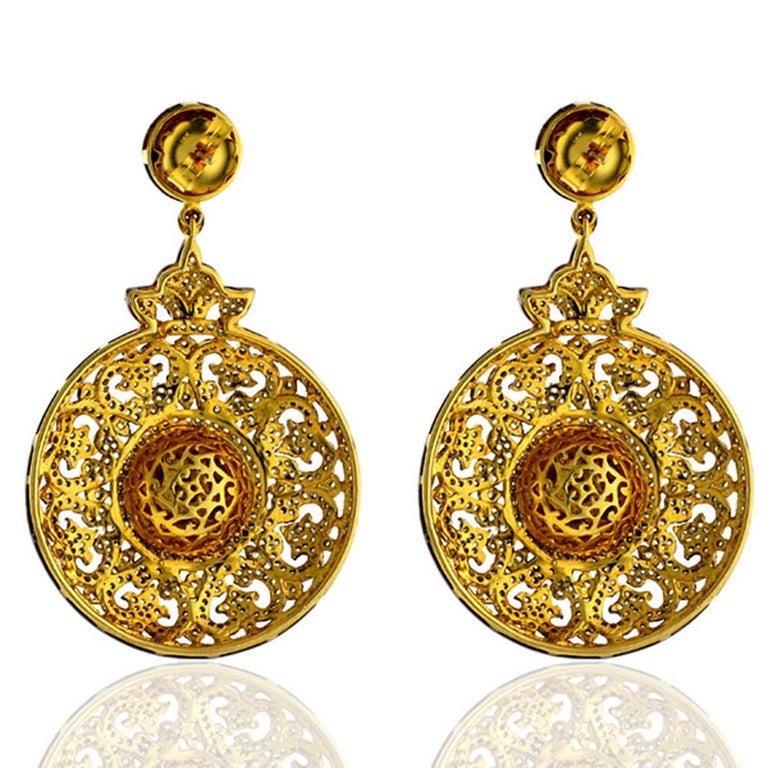 This Designer Pave and Rosecut and Diamond Dangling Earring in Silver and 14K Gold is a one of the most charming earring in our collection

Closure: Push Post

14kt Gold :5.16gms
Diamond:5.45cts
Silver:26.03gms