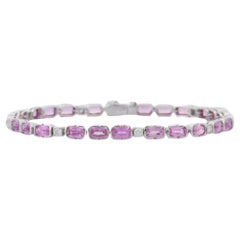 Bracciale Tennis con zaffiri rosa e diamanti in oro bianco massiccio 18 carati, di design