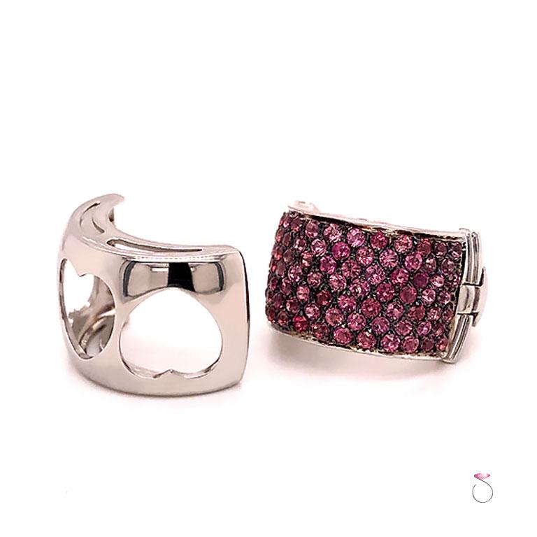 This stunning designer convertible ring features three open hearts designs and micro pave' set pink tourmaline in 18k white gold. Designed by Italian designer Assor Gioielli. This ring is so uniquely designed to convert between two different looks.
