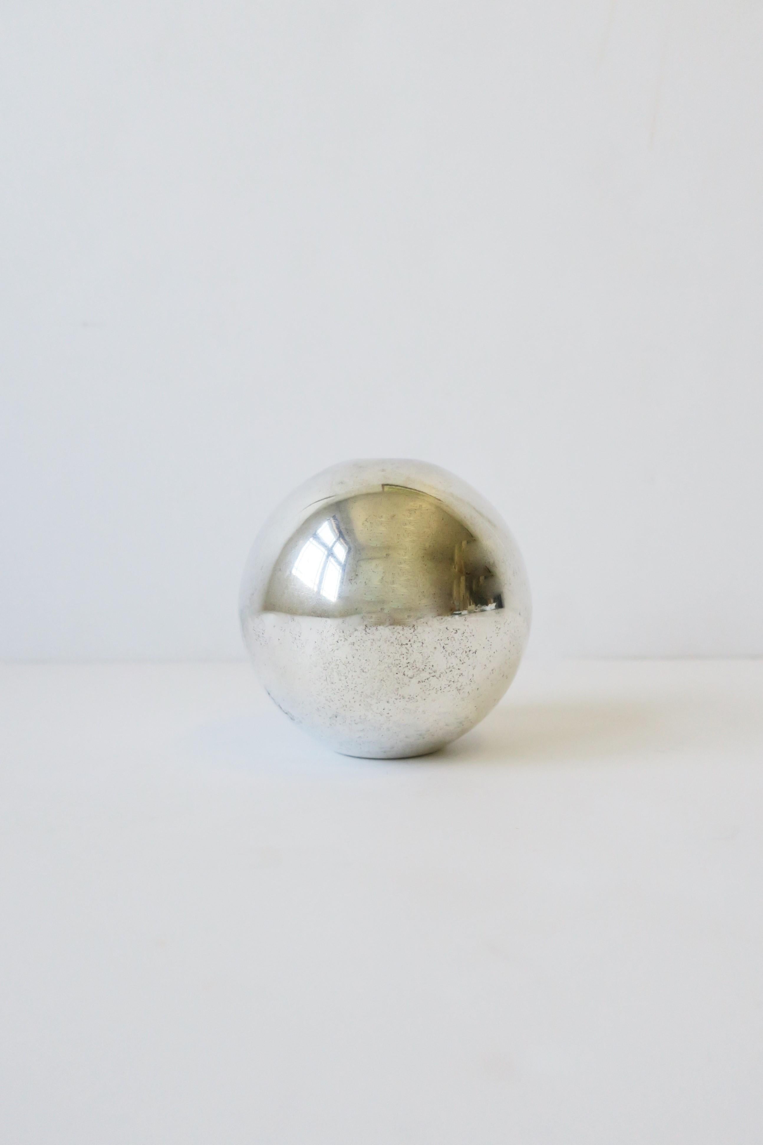 A rare, Robert Isabell 'Hole-in-One' bud vase for Swid Powell Co.
A very beautiful, rare, and substantial Postmodern period sterling silver plate over brass 'Hole-in-One' vase by American designer Robert Isabell for Swid Powell Co., circa 1980s.