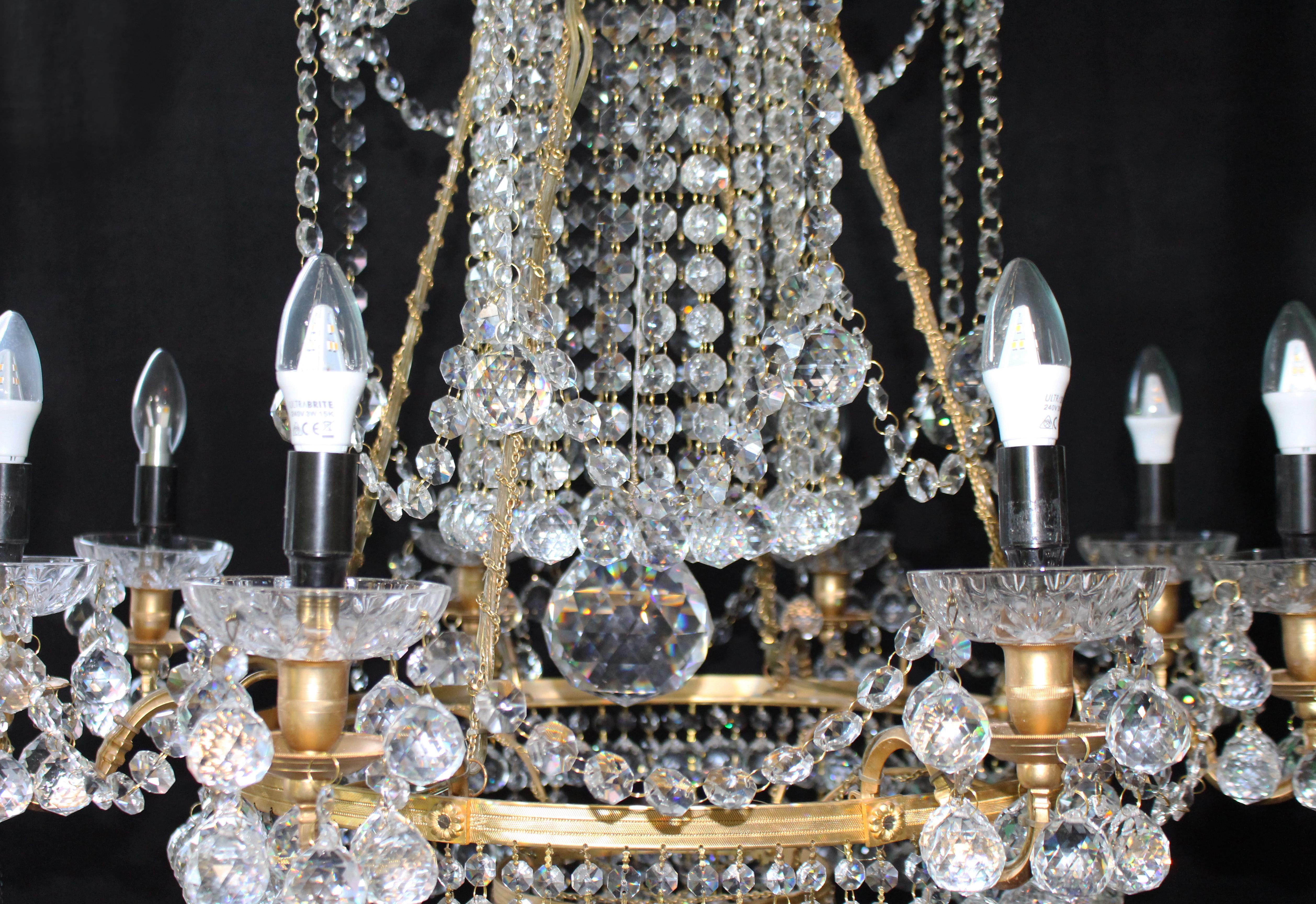 Designer Profusely Dressed Crystal Gilt Metal Chandelier For Sale 1