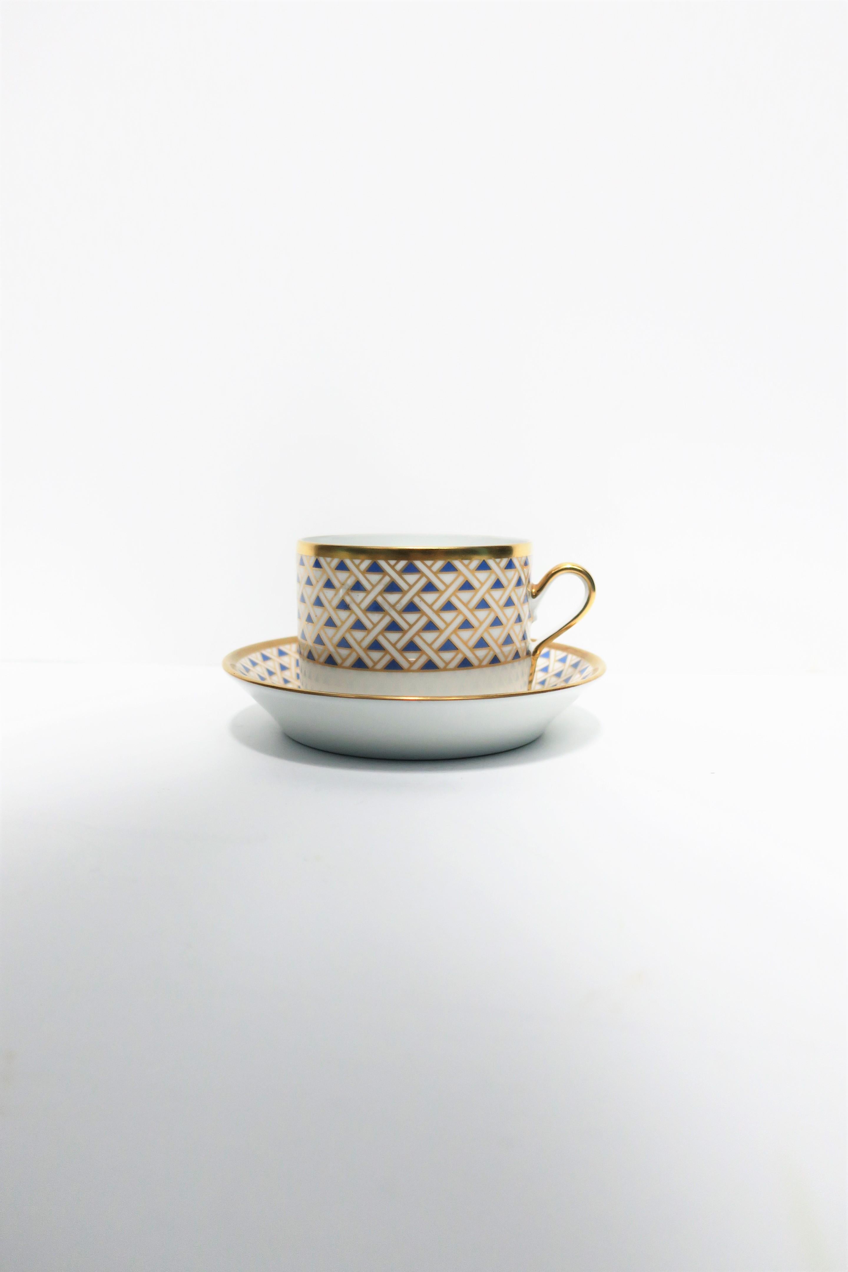 A very beautiful vintage Italian white porcelain, blue, and gold, coffee or tea cup and saucer by designer Richard Ginori, circa 20th century, Italy. Colors include, blue, gold, on white porcelain. With maker's mark on bottom as show in images #15,