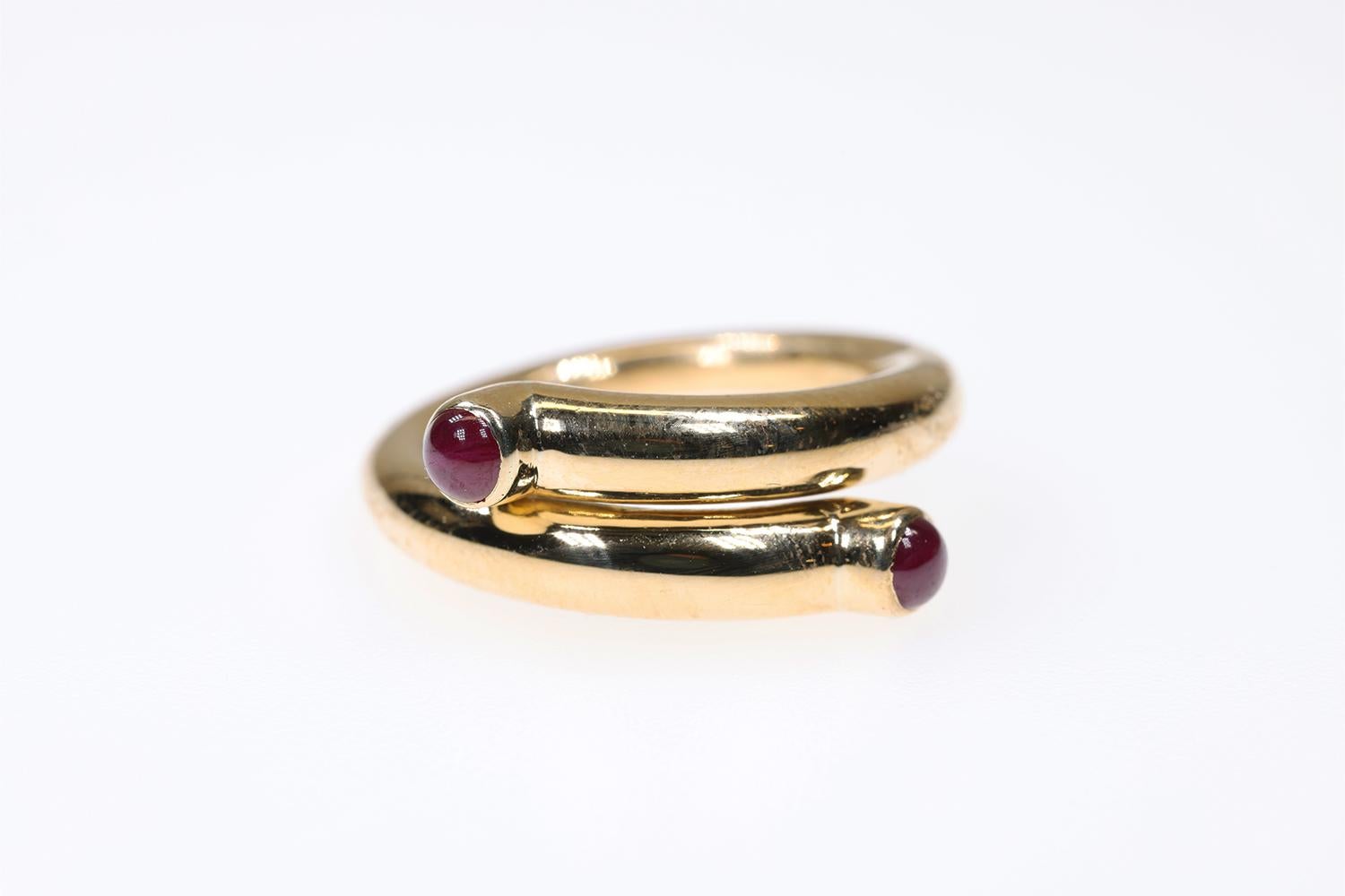 Designer ring by Tiffany & Co, Jean Schlumberger, 18k gold with Ruby Cabochons. A classic iconic piece of jewelry that is timeless in its design and fabrication. Made by Tiffany & Co this ring features the best of everything and is a true collector