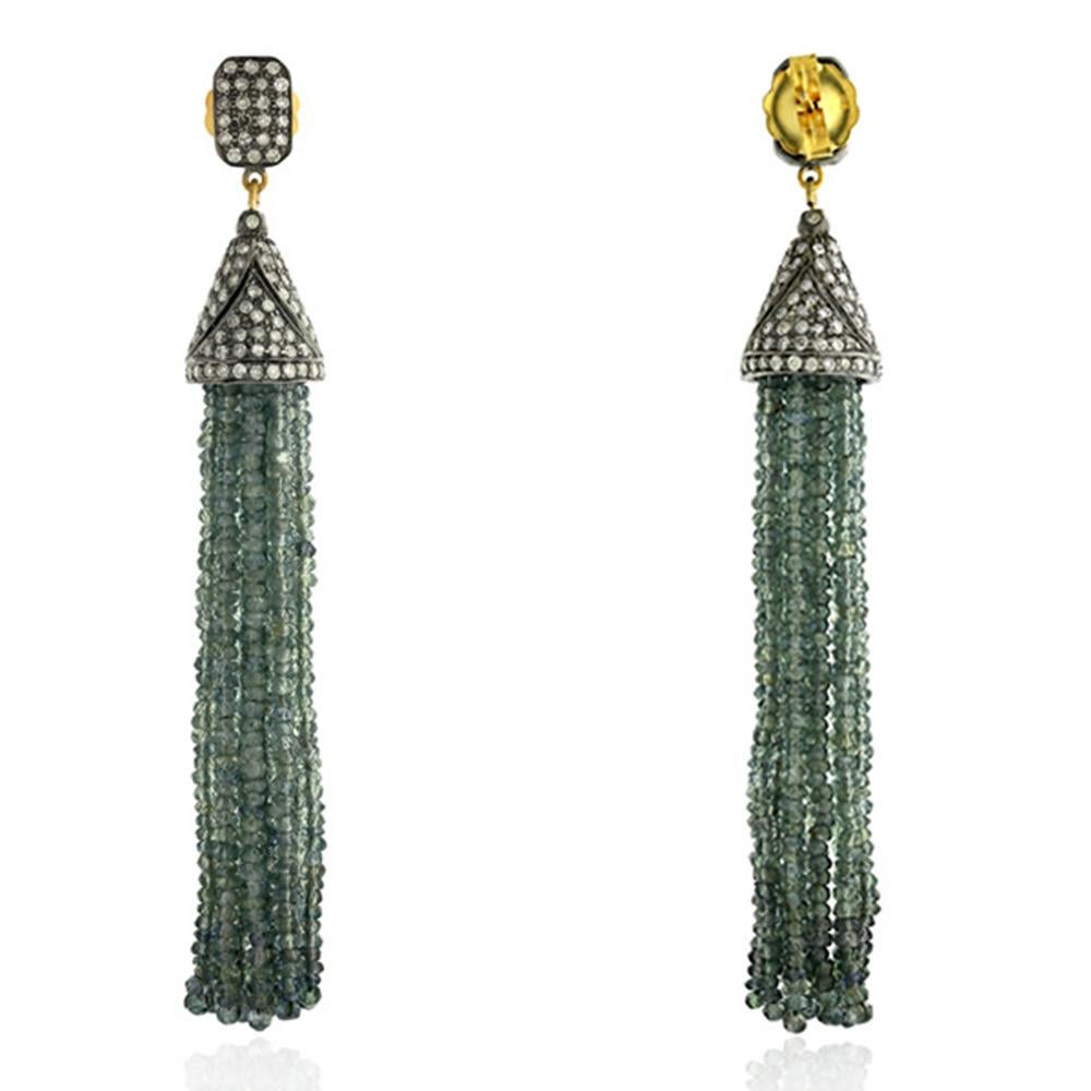 This Designer Sapphire and Diamond Tassel Earring in Gold and Silver is light weight and pretty.

18kt gold:2.32gms
Diamond:3.08cts
Sapphire Multi:98.35cts
