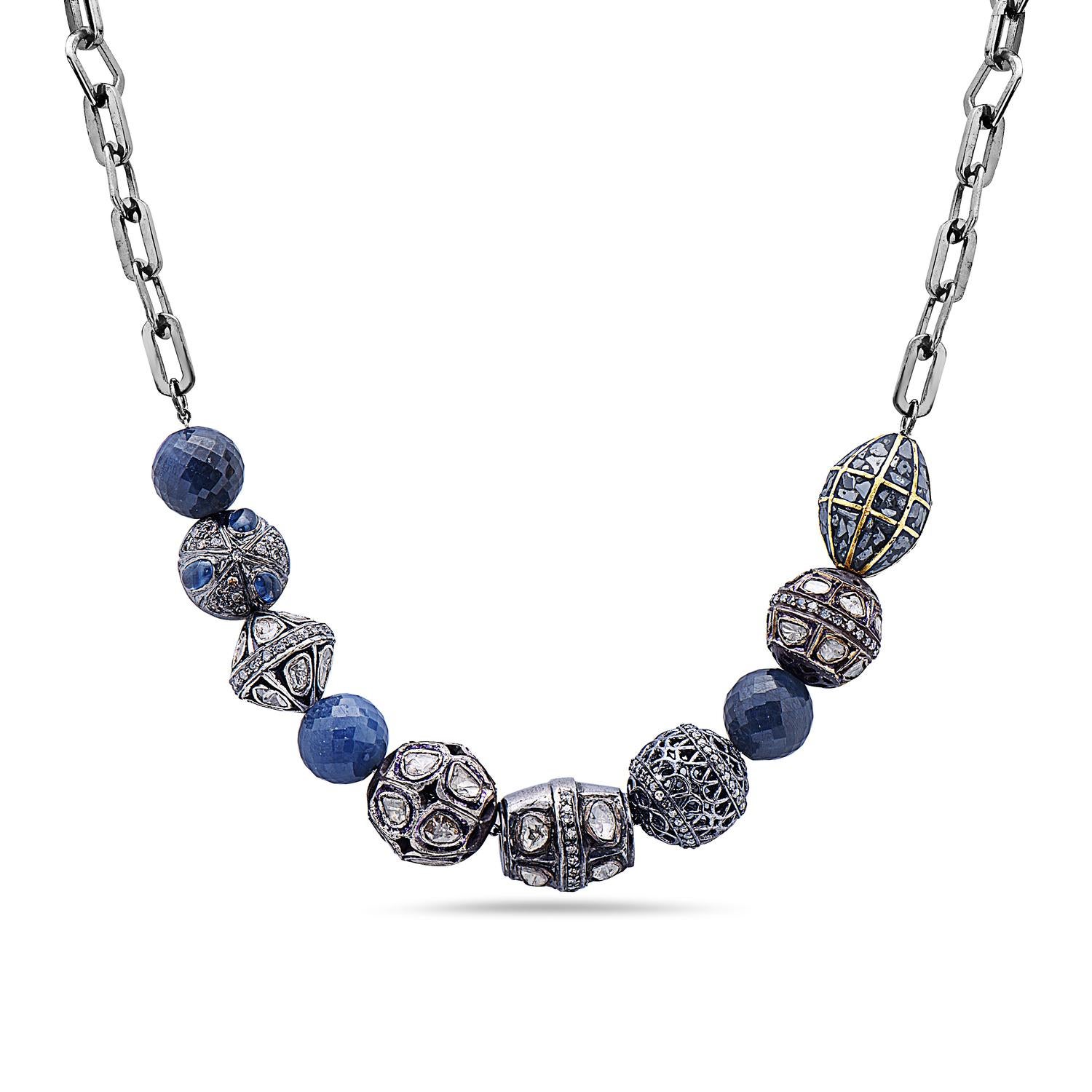 Designer Sapphire and Silver and Diamond Beaded Necklace with Link Chain is 32 inch long and can be layered with smaller chains on top. It's pretty and boho style.

Silver:40.51gms
Diamond:6.55cts
Sapphire:33.45cts
