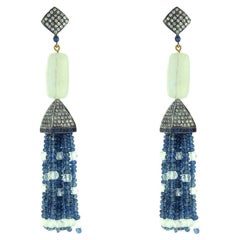 Boucles d'oreilles de créateur à pompon en or avec saphir, pierre de lune, cristal et diamants