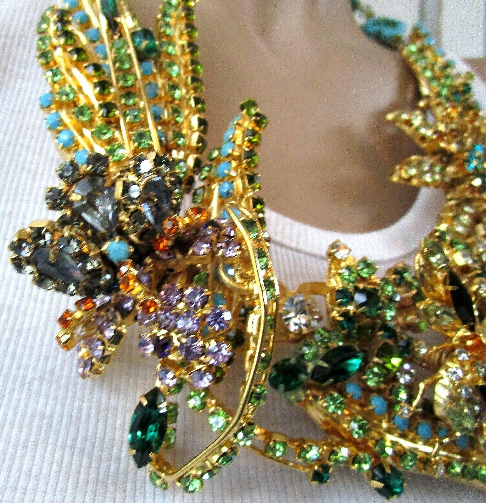 Fabulous Rare Museum Quality Designer Ken Morrison Crystal Bumble Bee Garden Necklace set with Swarovski crystals and a Trembler bumble bee amongst colorful foliage and flowers, suspended from open work turquoise clovers with givre (frosted) Murano