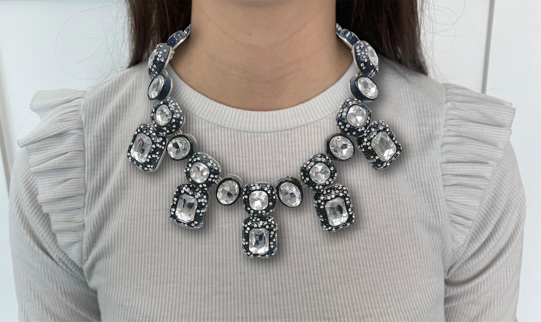 Designer statement Crystal Necklace. Black Japanned mounting featuring thick square beaded metal Links alternating with oval bezel links. Square links set with large cushion cut clear crystals and small black and clear crystals dotted around the