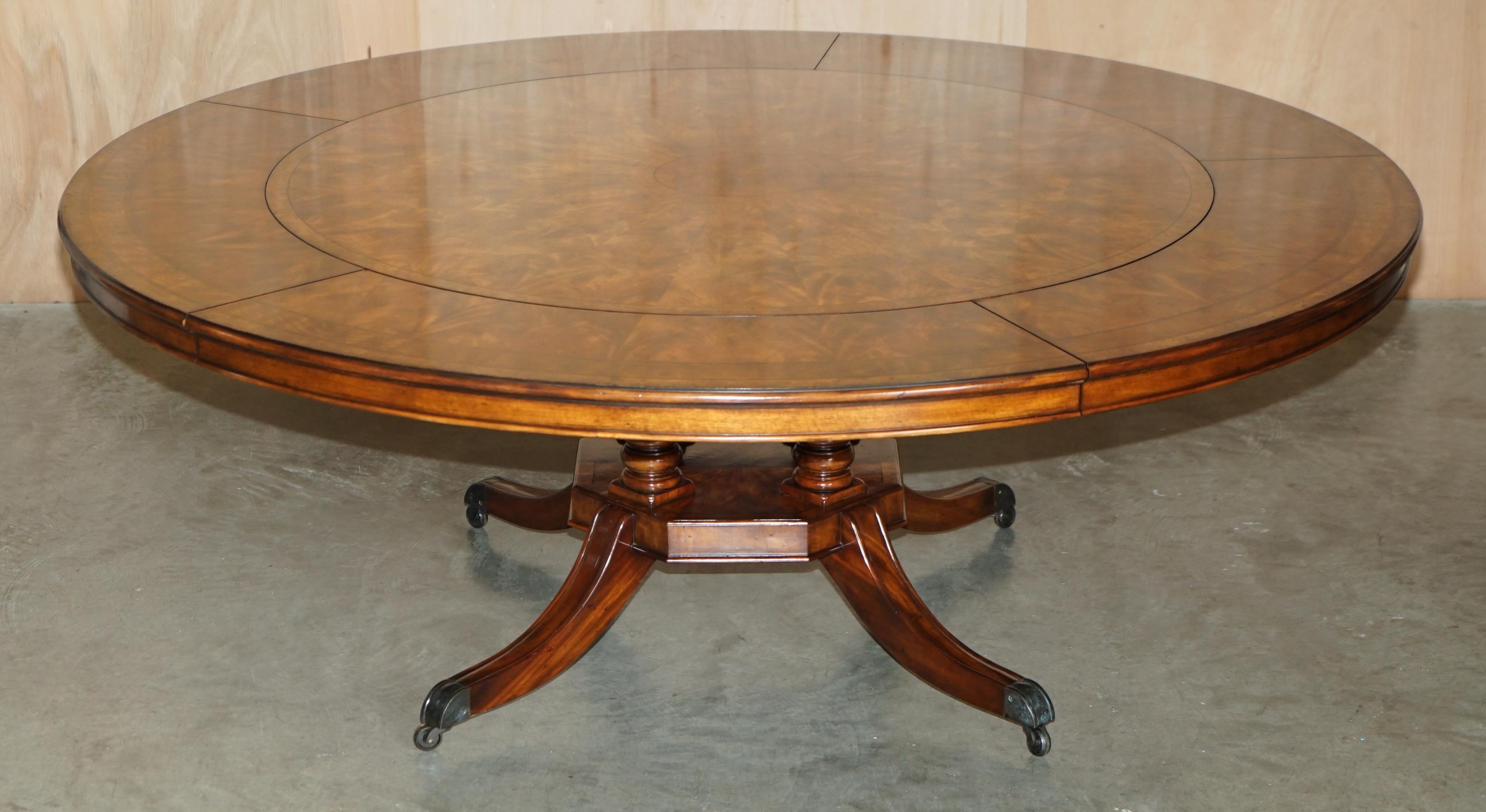  DESIGNER THEODORE ALEXANDER WALNUT EXTENDING ROUND JUPE DiNING TABLE For Sale 6