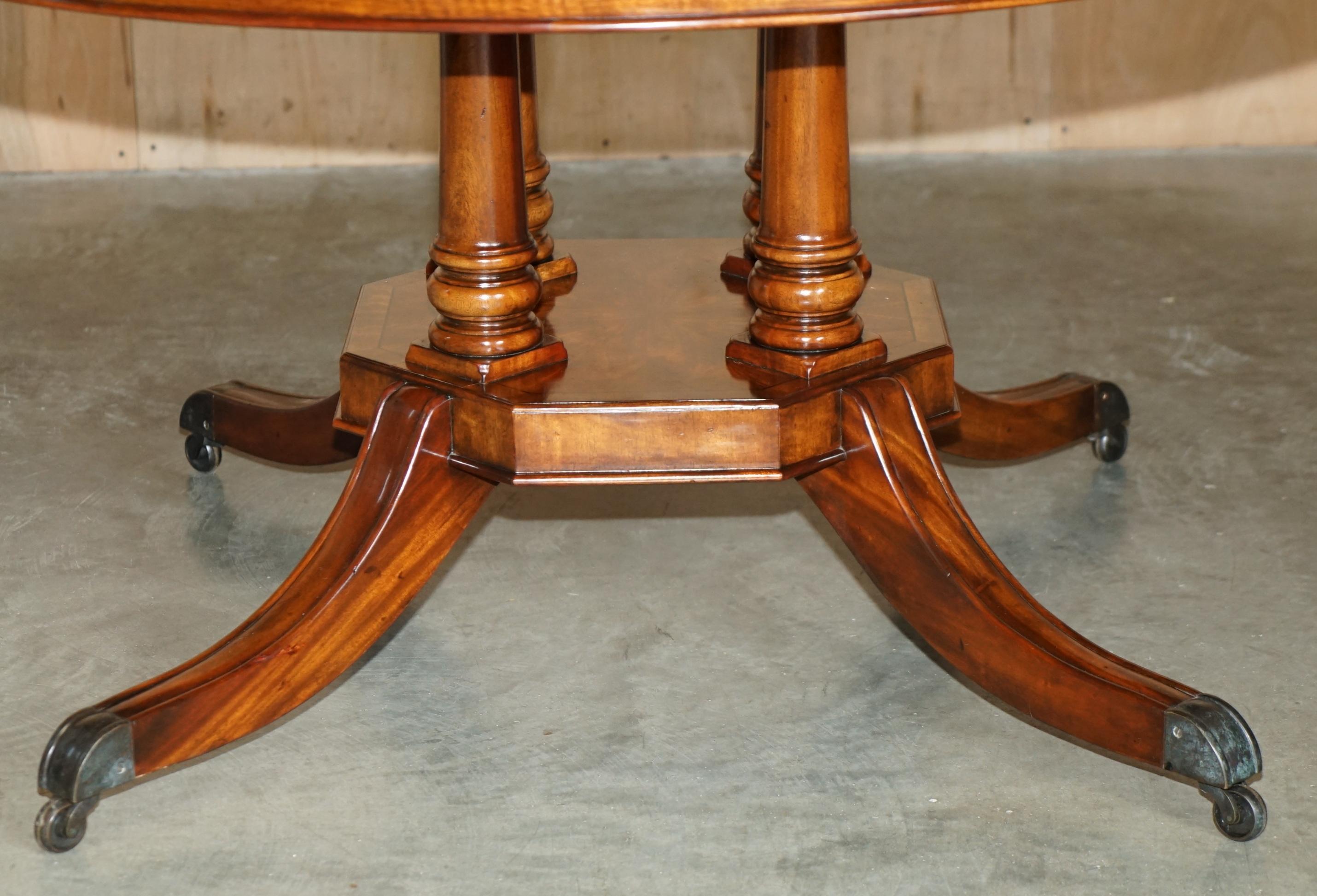  DESIGNER THEODORE ALEXANDER WALNUT EXTENDING ROUND JUPE DiNING TABLE For Sale 1
